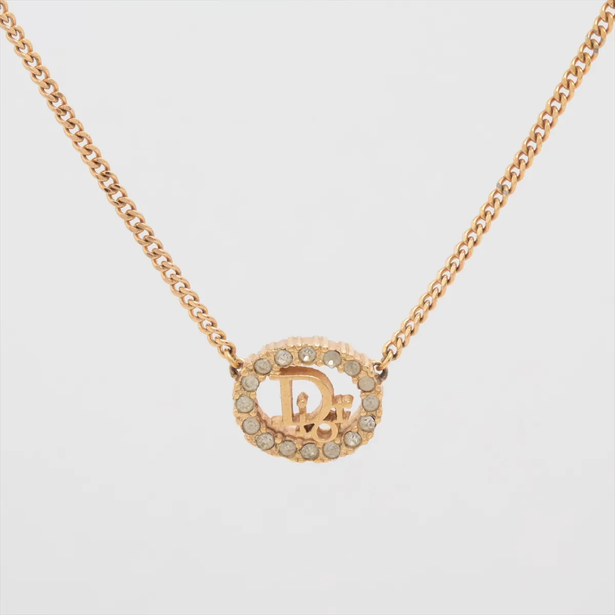 logo necklace, gold plated with rhinestones. Includes earrings (2-piece set). Shows signs of wear, including dents, — view 2