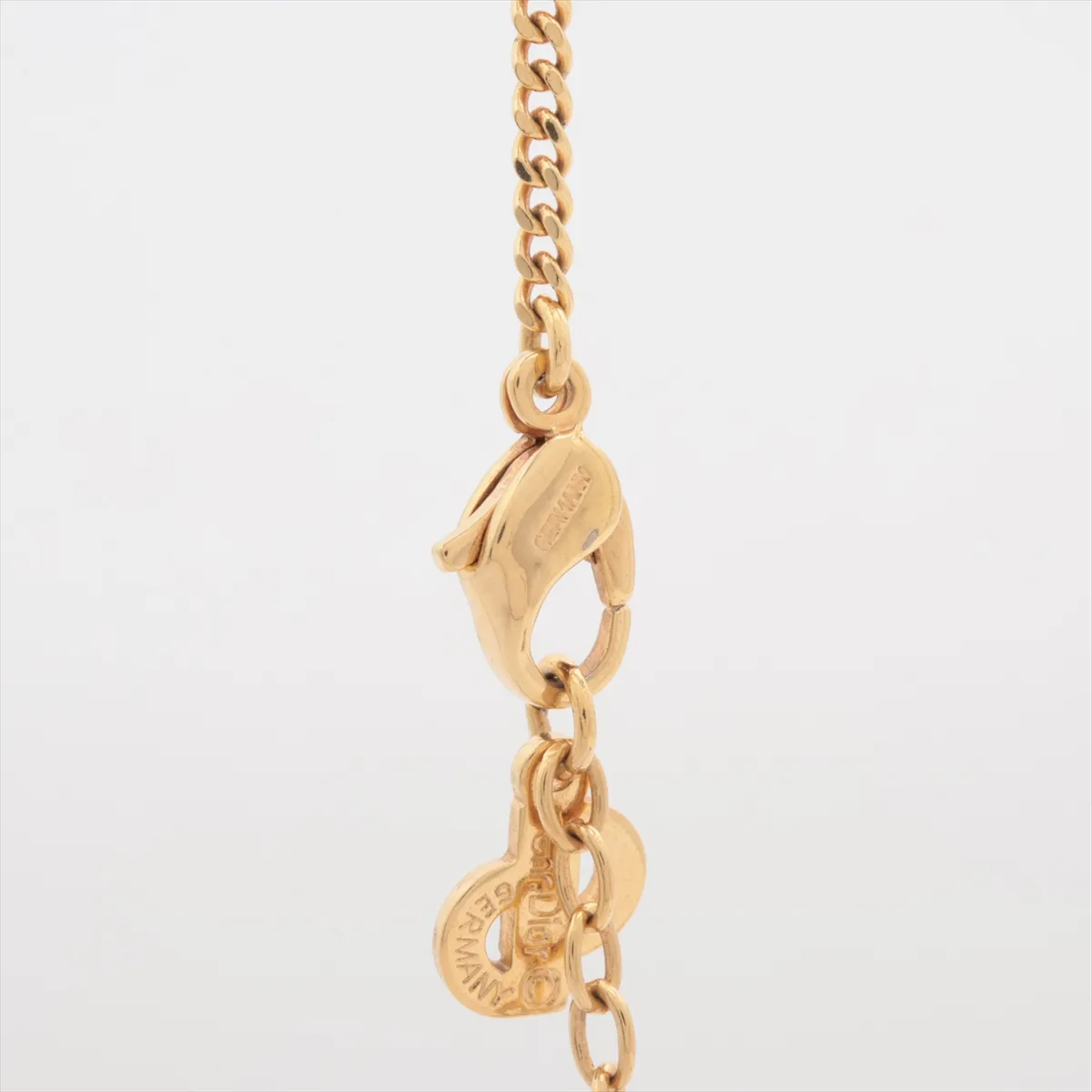 logo necklace, gold plated with rhinestones. Includes earrings (2-piece set). Shows signs of wear, including dents, — view 4