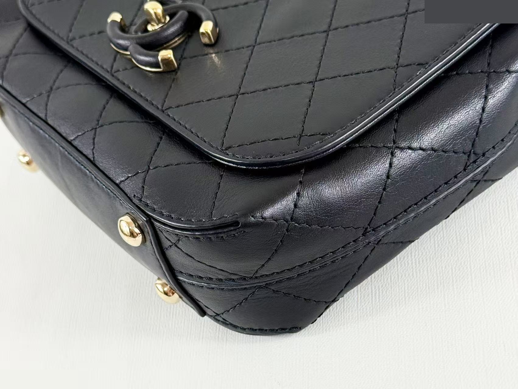 Black Matelassé Tanlock Shoulder Bag, approximately 20cm wide, serial number in the 27 range. — view 6