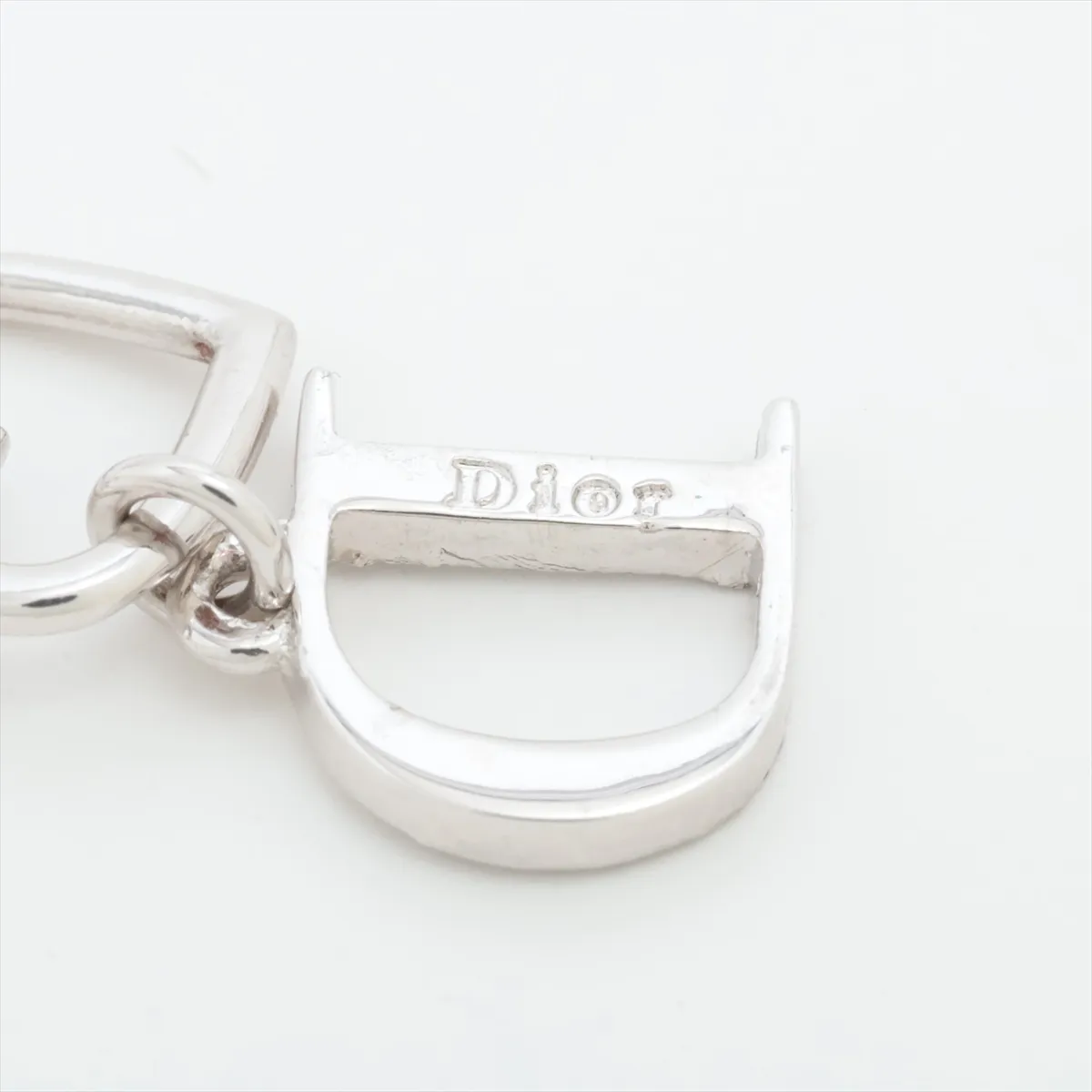 D-logo earrings (for both ears), metal and rhinestone, silver. Shows signs of wear, — view 5