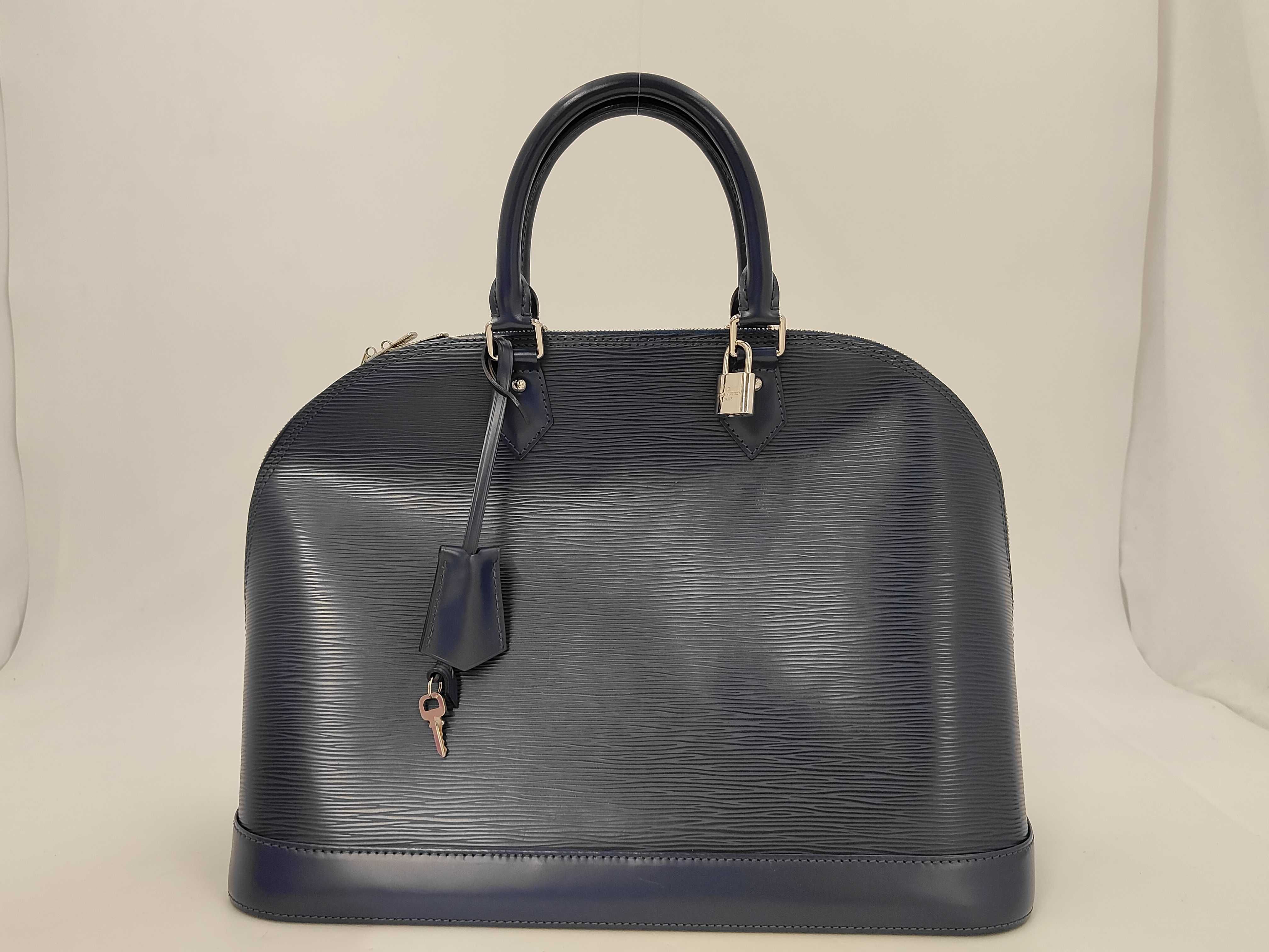 Alma GM Epi Navy Handbag