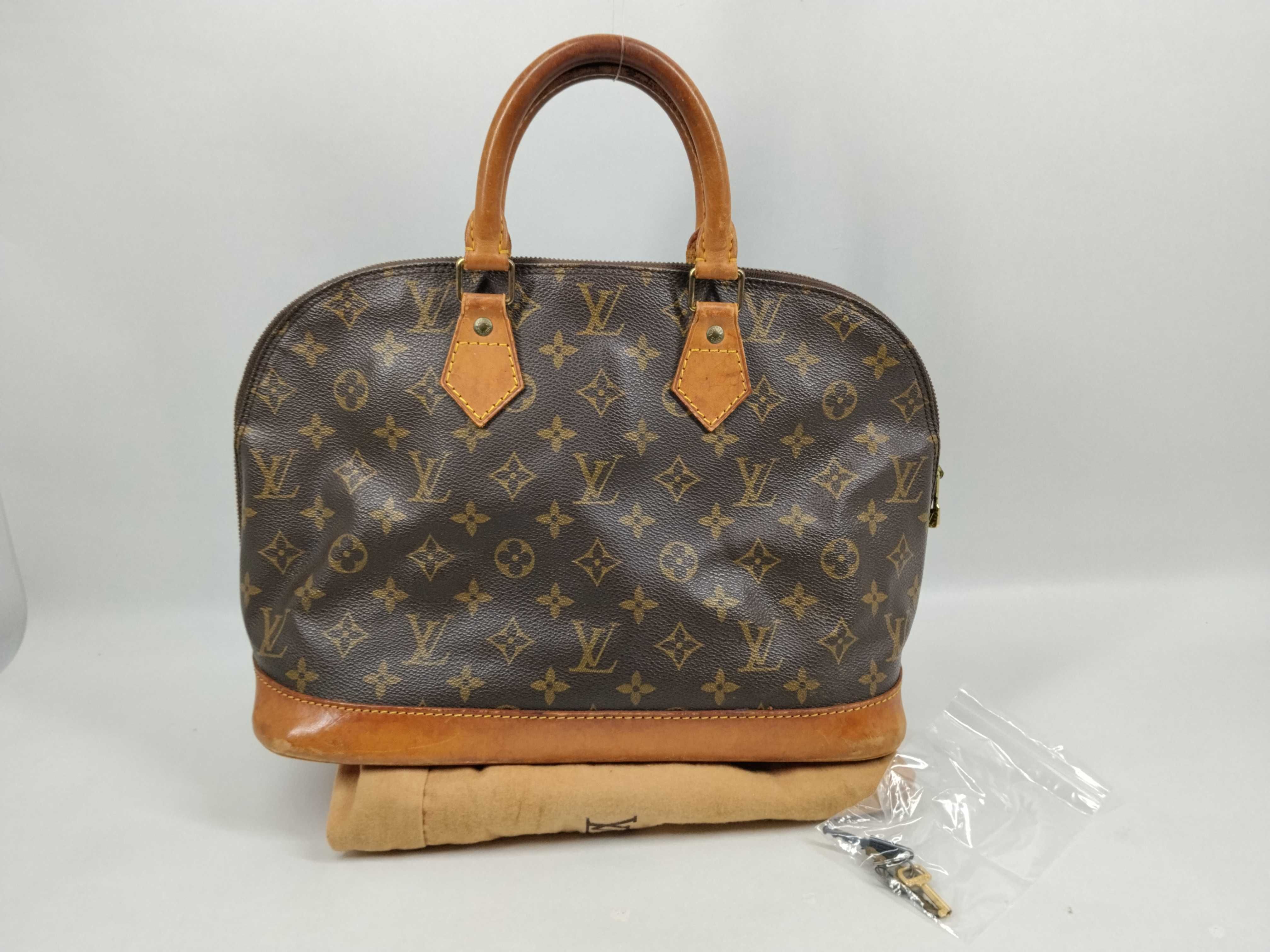Monogram M40878 Alma MM (Deformed) Handbag