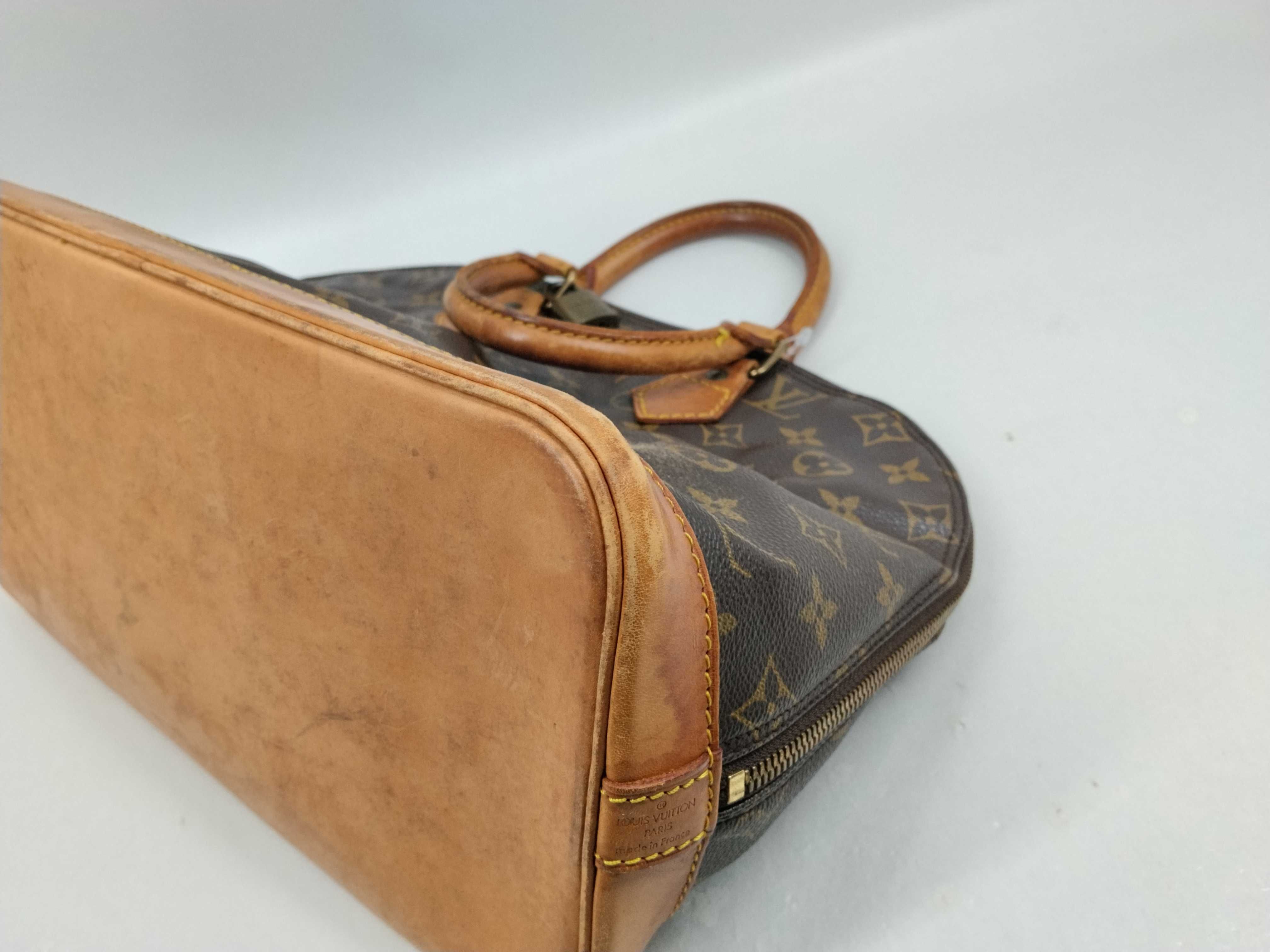 Monogram M40878 Alma MM (Deformed) Handbag — view 9