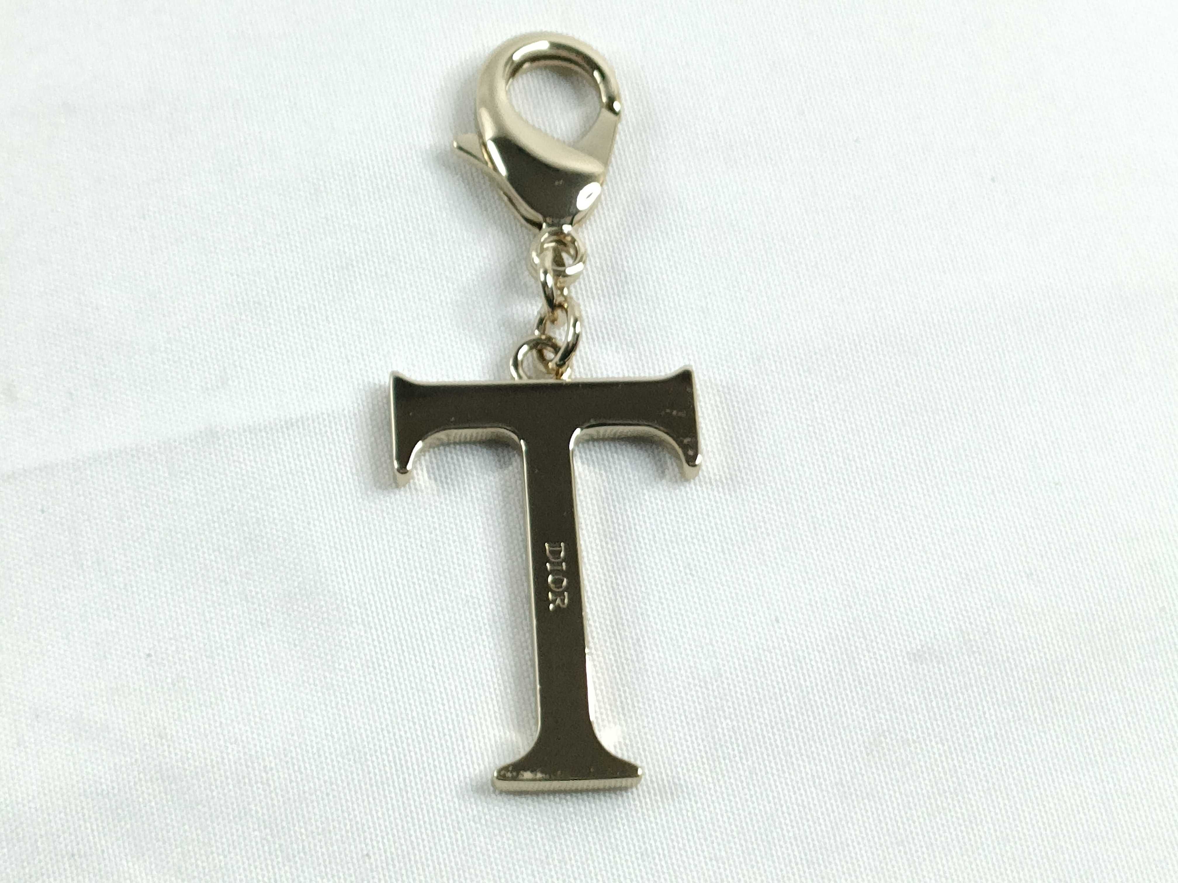 Roman Letter Charm "T" with Tag and Dust Bag — view 2