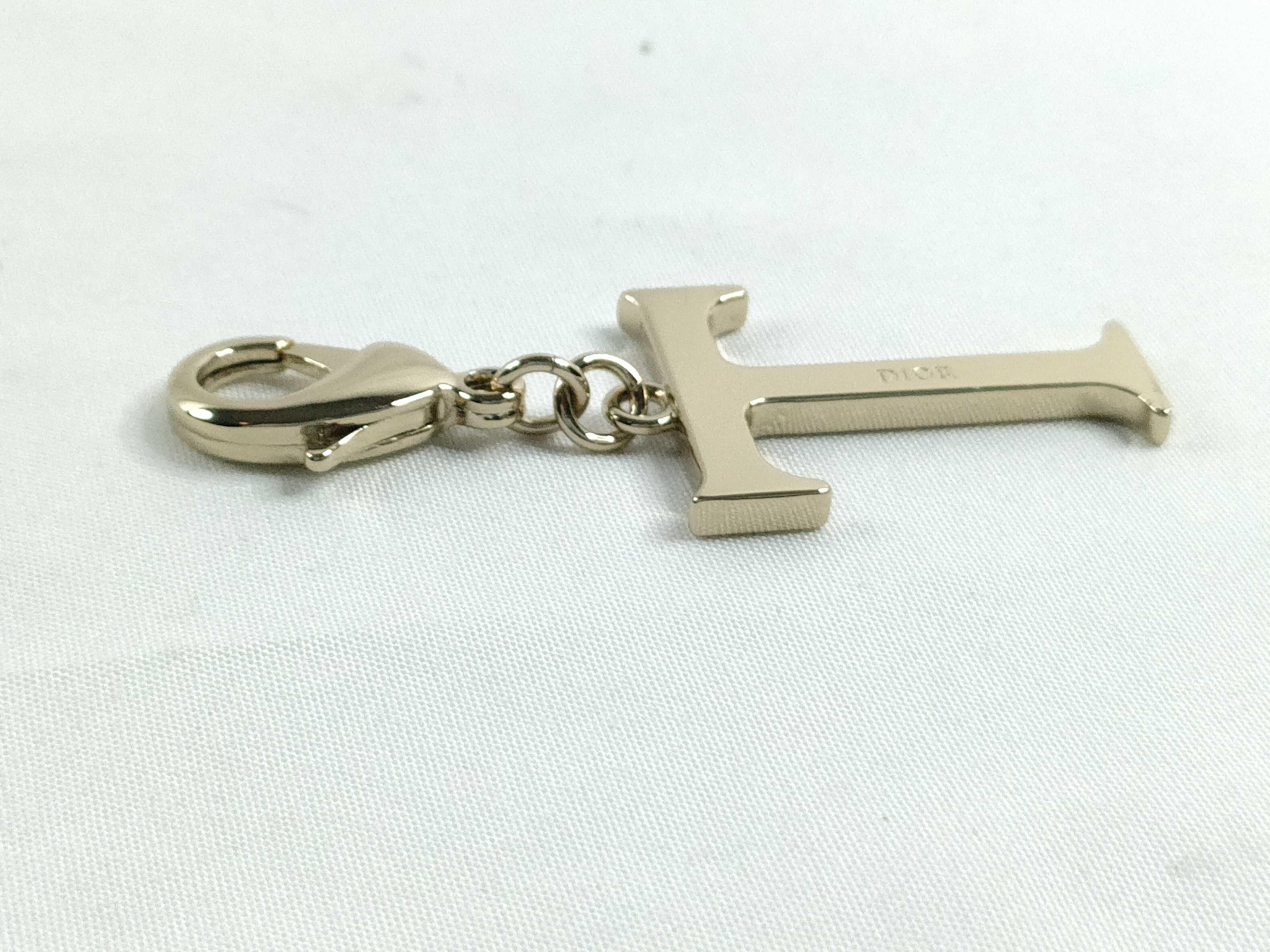 Roman Letter Charm "T" with Tag and Dust Bag — view 4