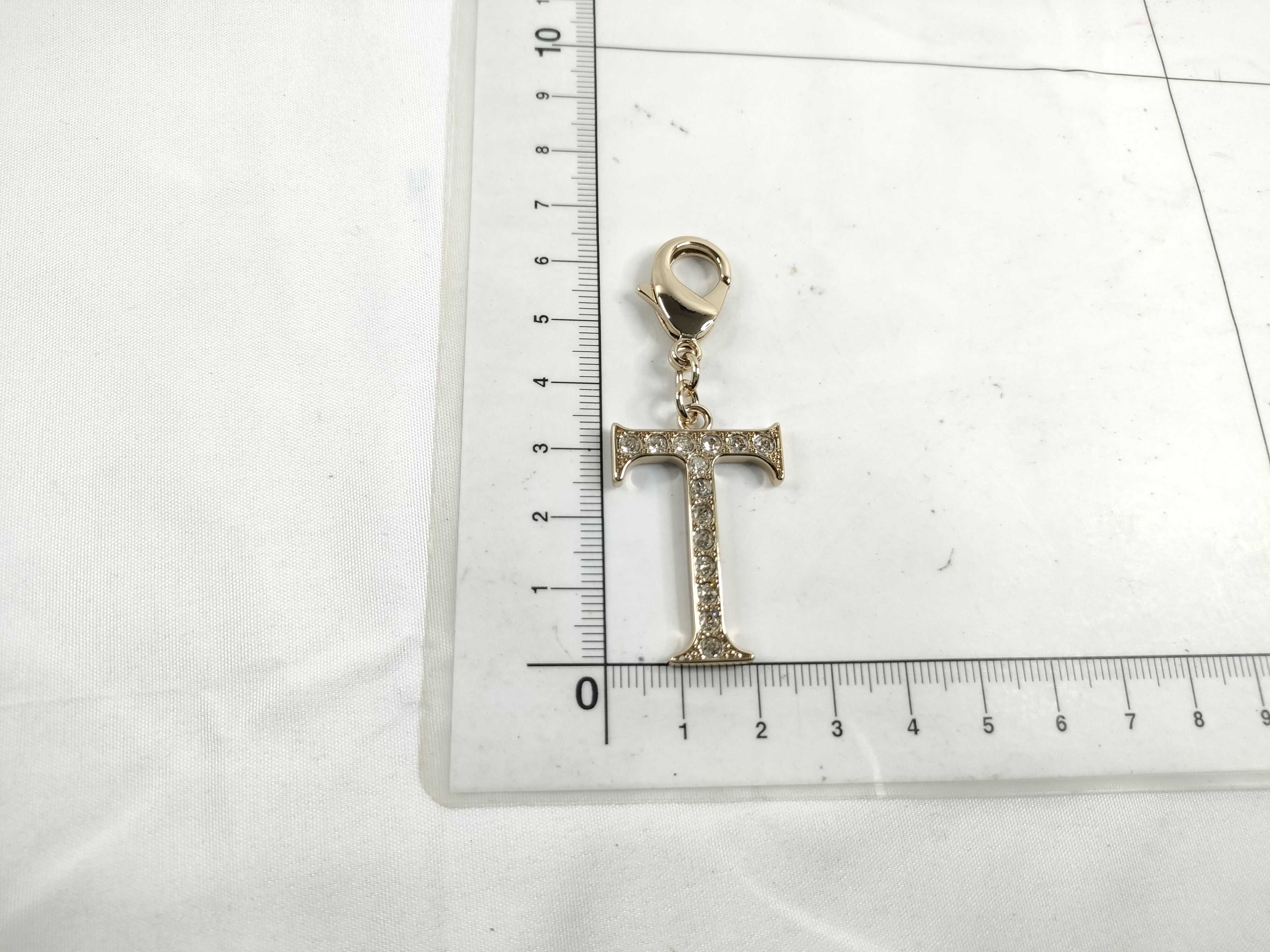 Roman Letter Charm "T" with Tag and Dust Bag — view 7