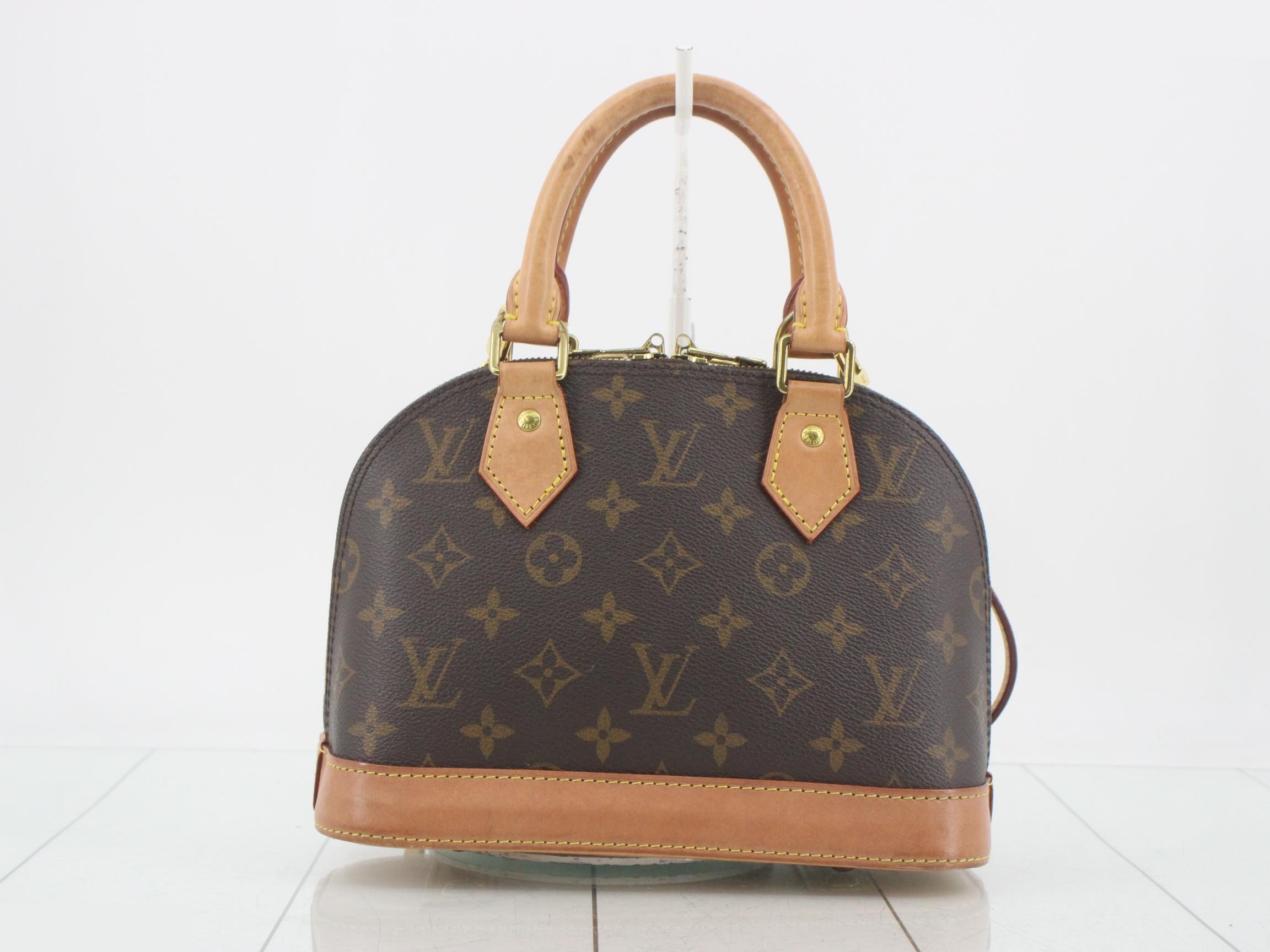 Monogram Alma BB shoulder strap, padlock, 2 keys, and clochette. — view 2