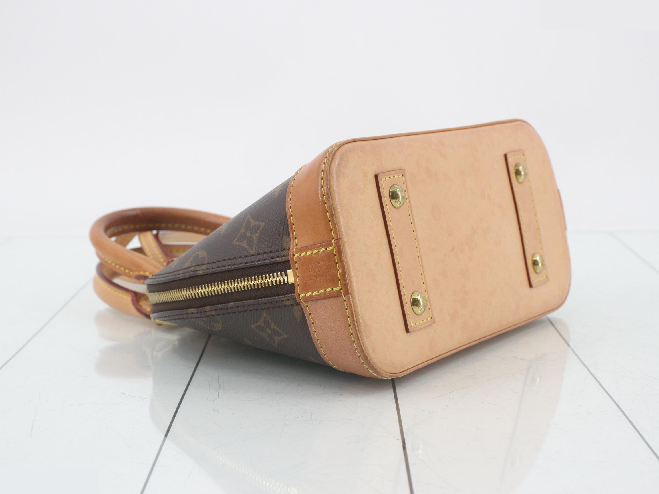 Monogram Alma BB shoulder strap, padlock, 2 keys, and clochette. — view 5