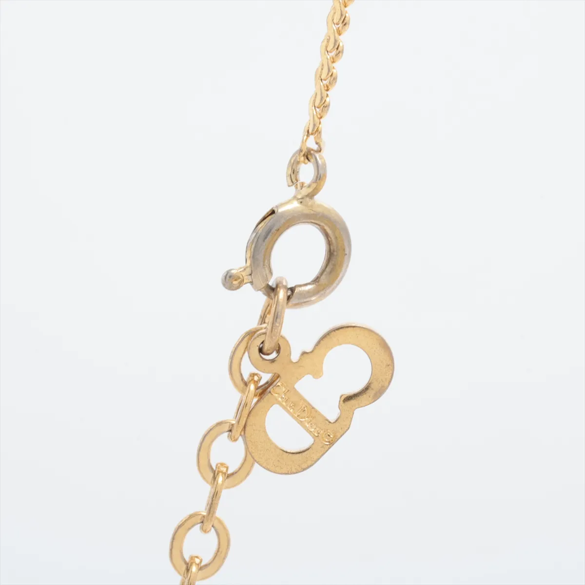 CD logo necklace, gold plated with rhinestones. Shows signs of wear, — view 3