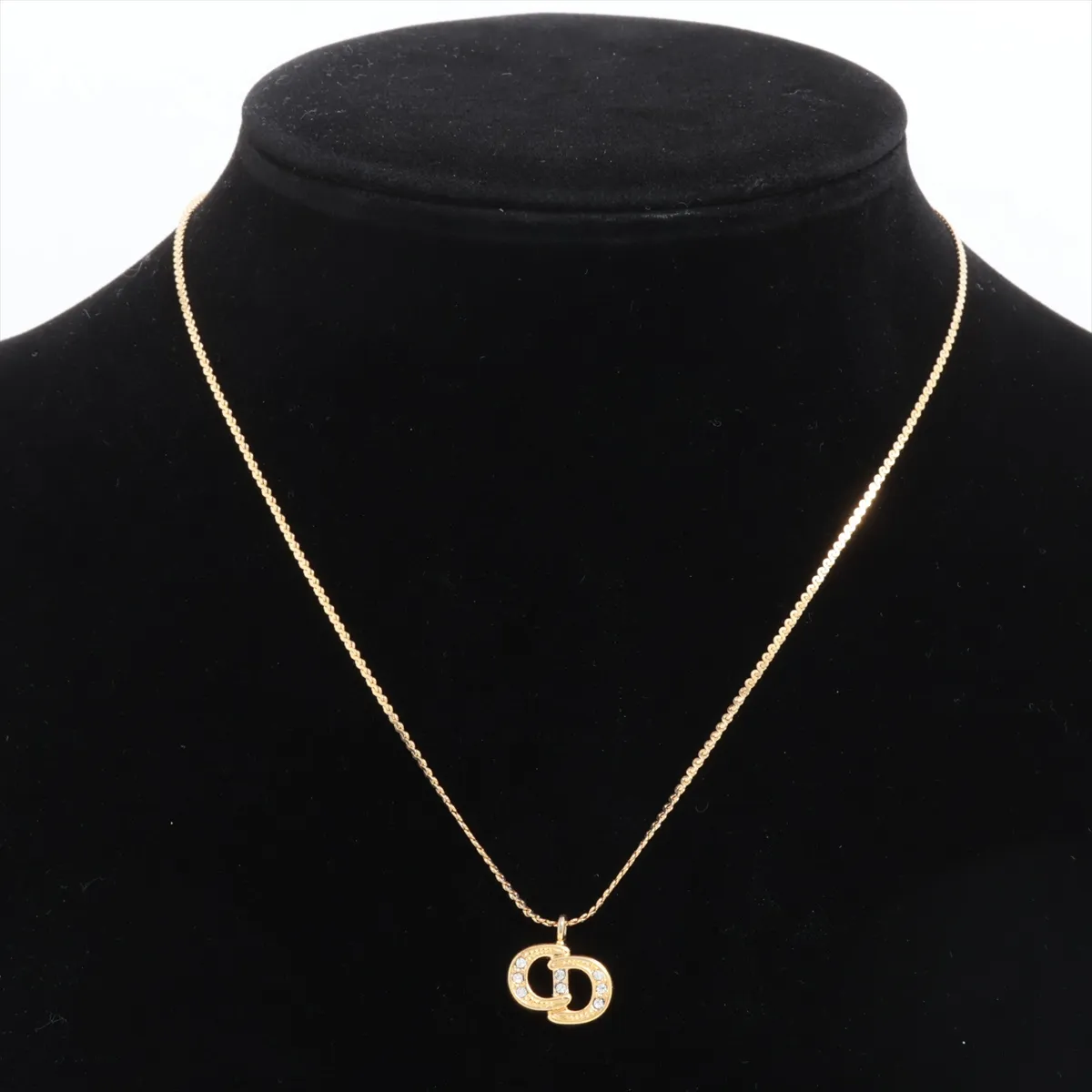 CD logo necklace, gold plated with rhinestones. Shows signs of wear, — view 5