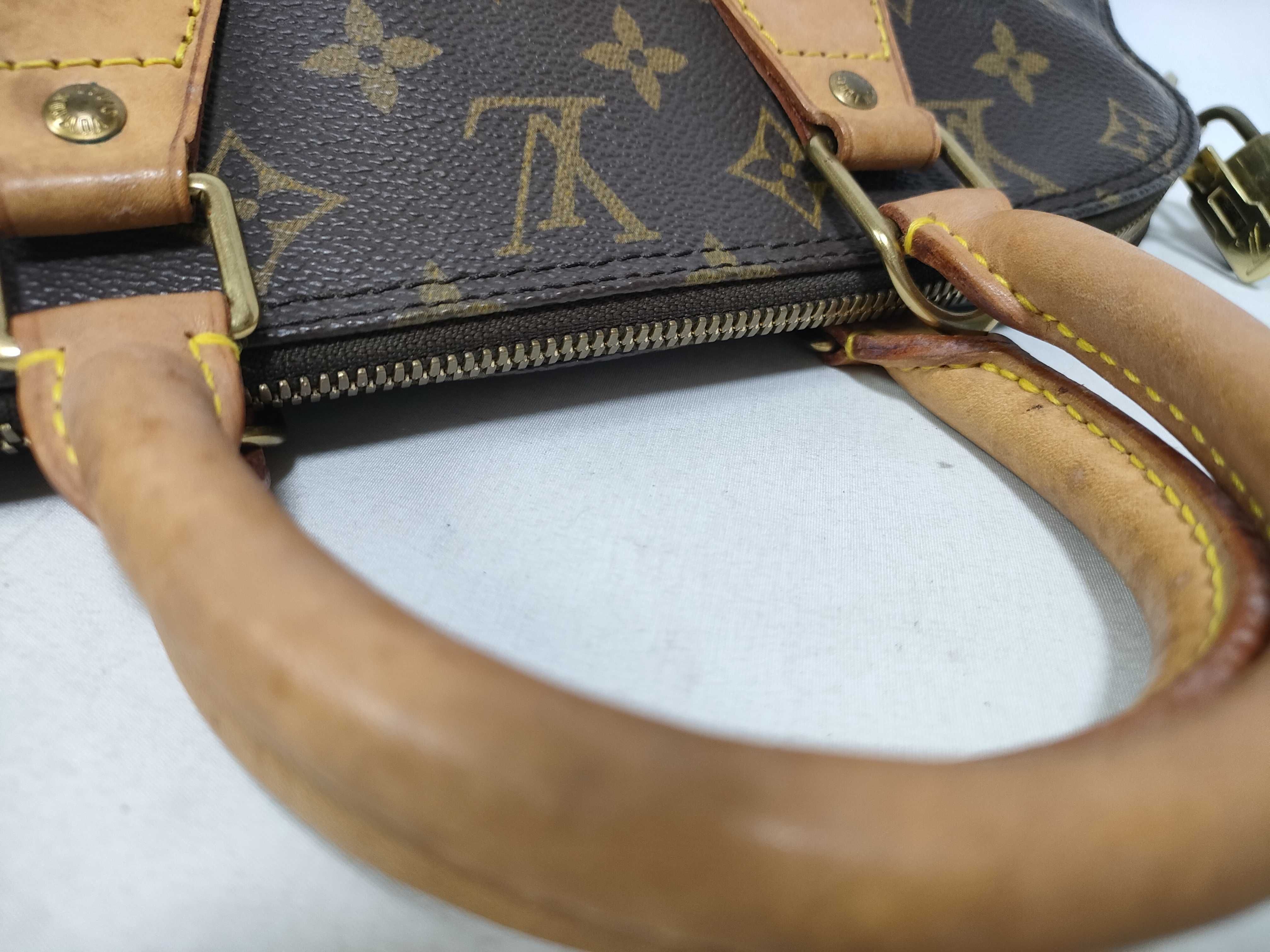 Monogram Alma M51130 VI0917 Handbag — view 12