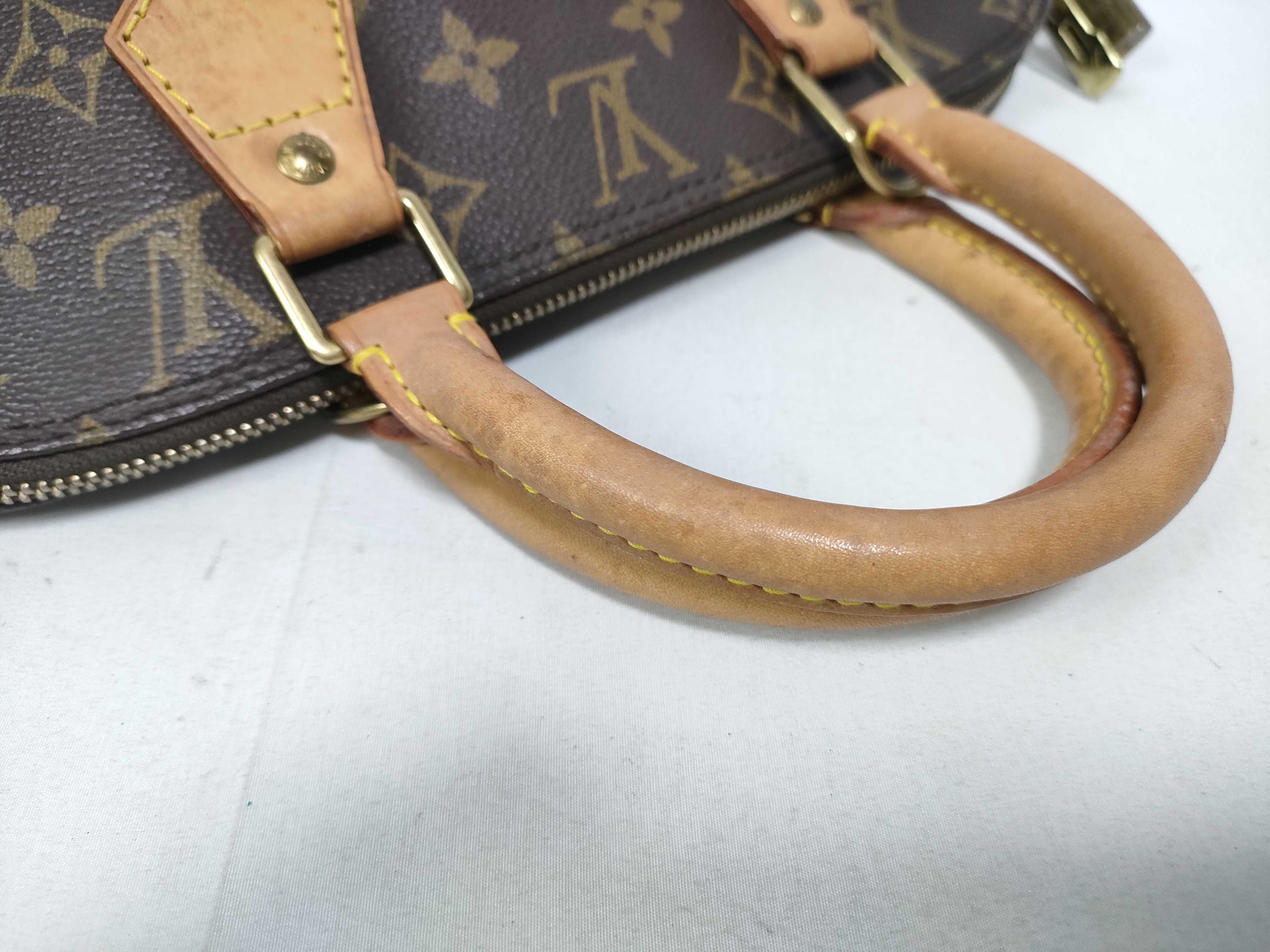 Monogram Alma M51130 VI0917 Handbag — view 9