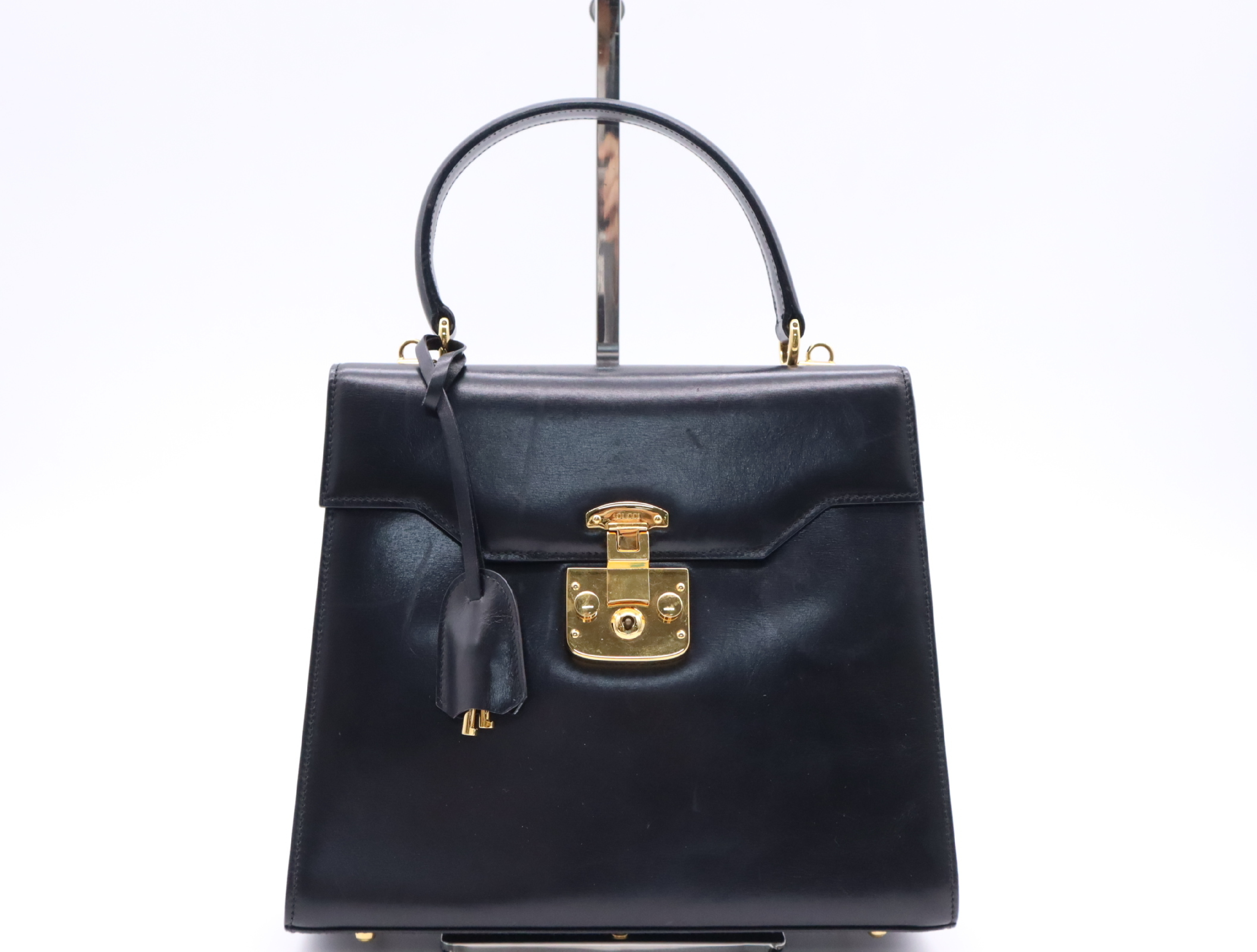 000.26.0258 Leather Lady Lock Handbag, Black with Gold Hardware, Includes Clochette and 2 Keys.
