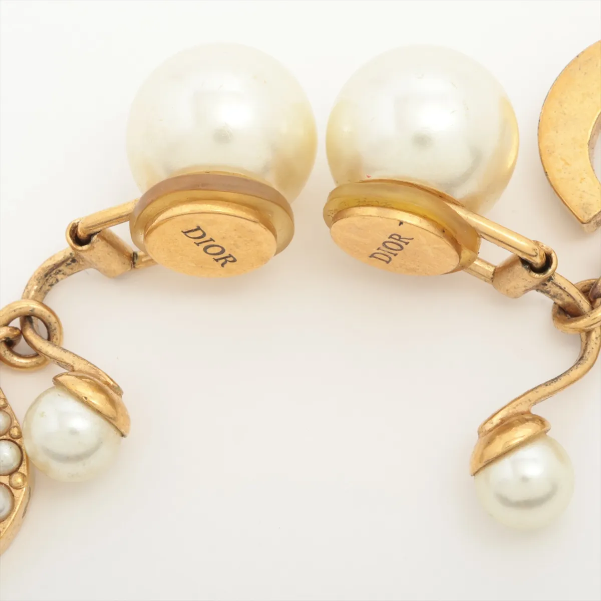 Tribales earrings (for both ears), gold-plated with faux pearls. Shows signs of wear including — view 4