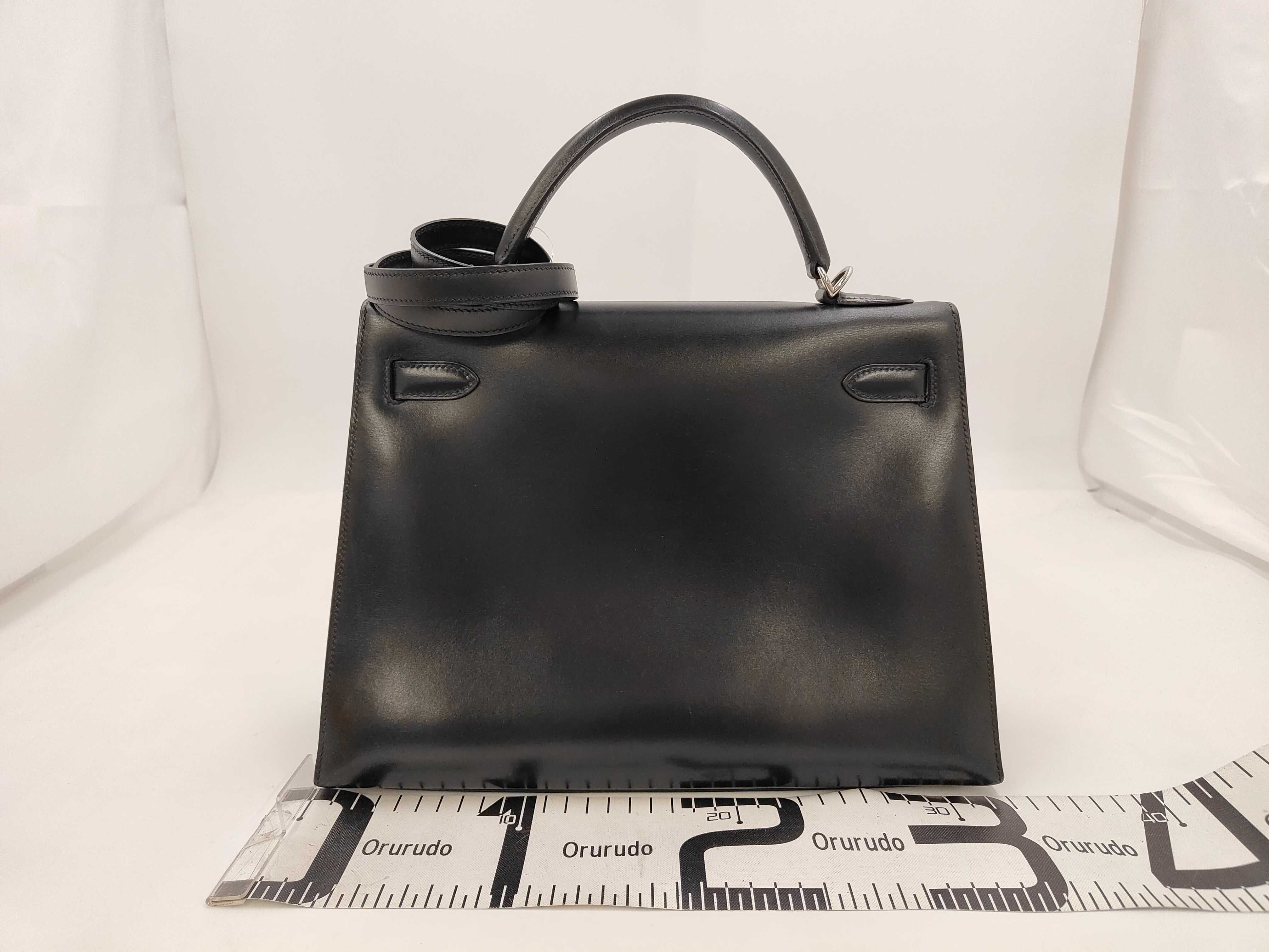 Kelly 32, external stitching, box calf leather, black, silver hardware, D stamp, handbag — view 2