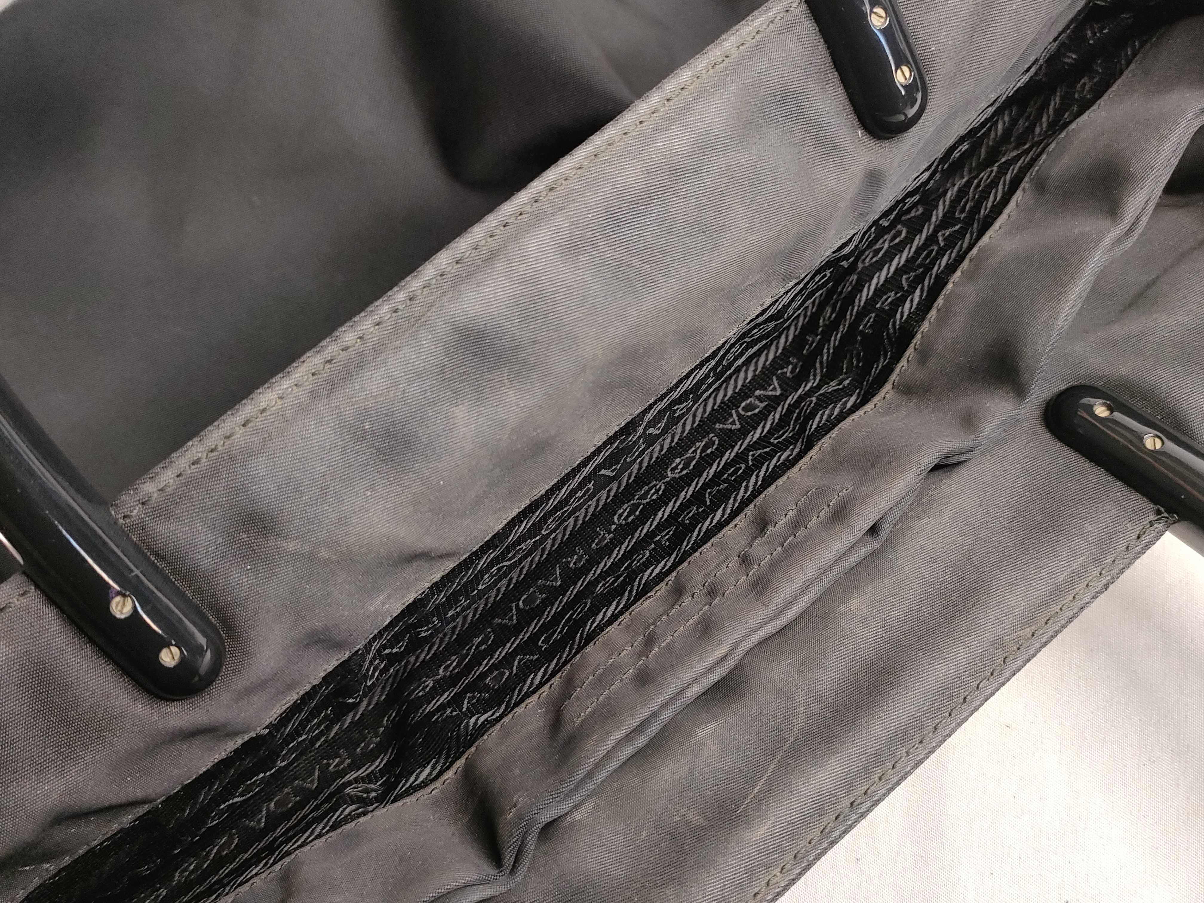 nylon handbag, black, with plastic handle and triangular plate. — view 15