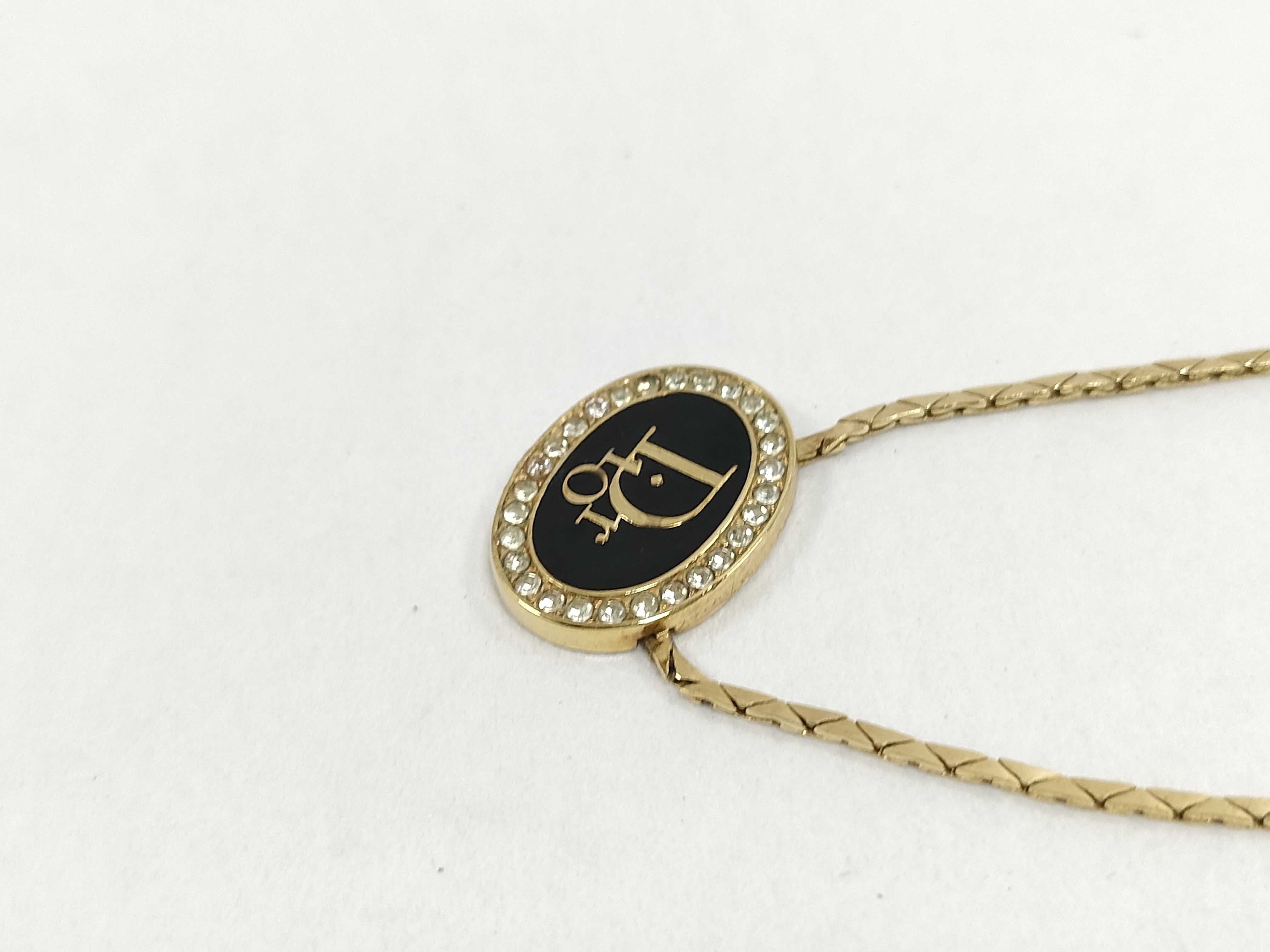 logo rhinestone gold necklace with box/bag. — view 9