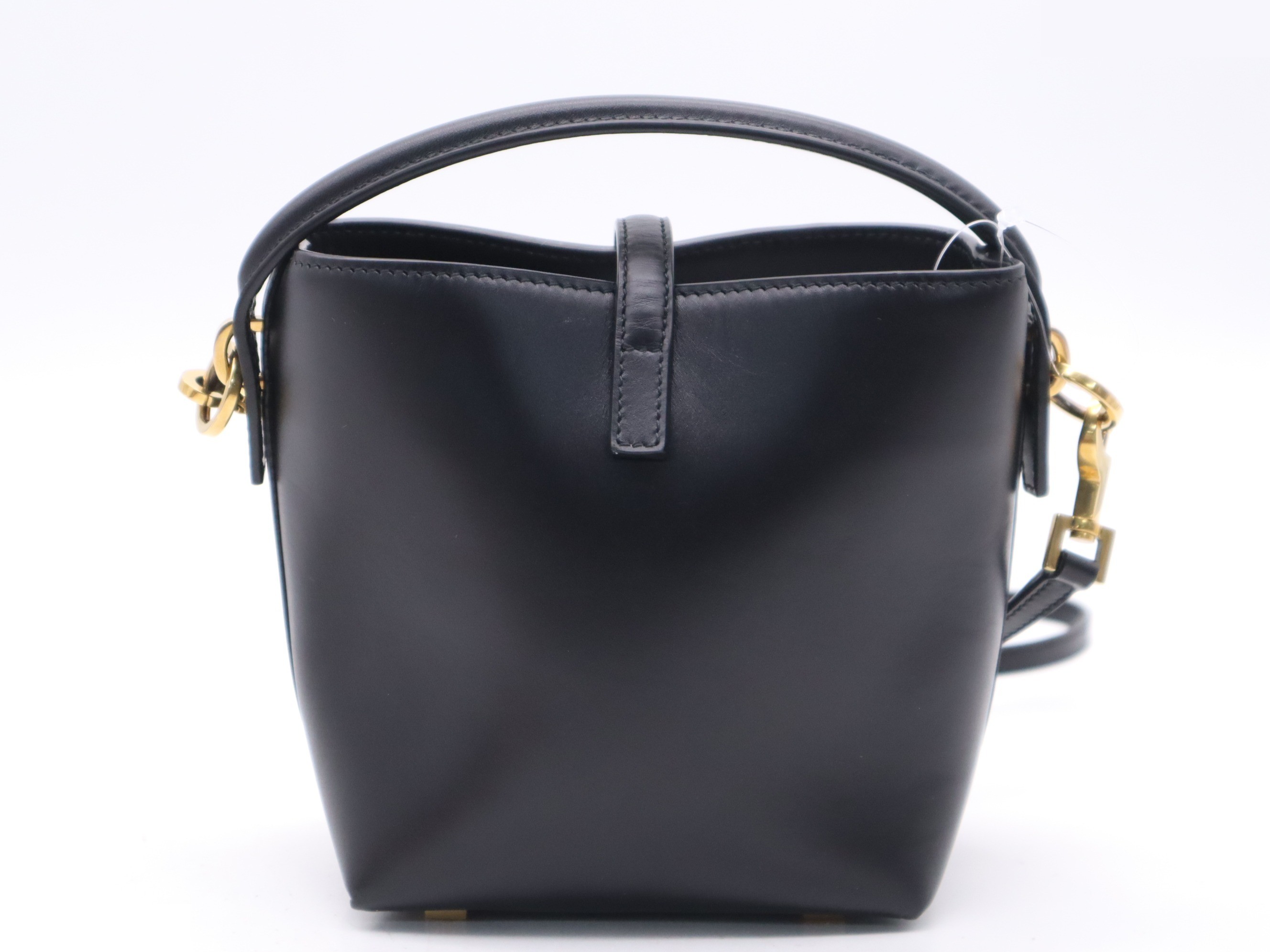 Leather YSL logo bucket bag, black, gold hardware, with shoulder strap. — view 2