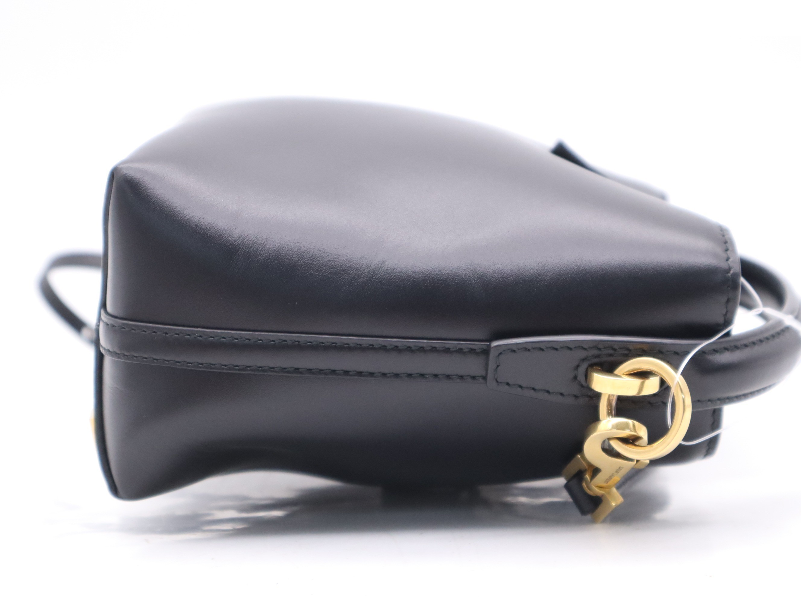 Leather YSL logo bucket bag, black, gold hardware, with shoulder strap. — view 5