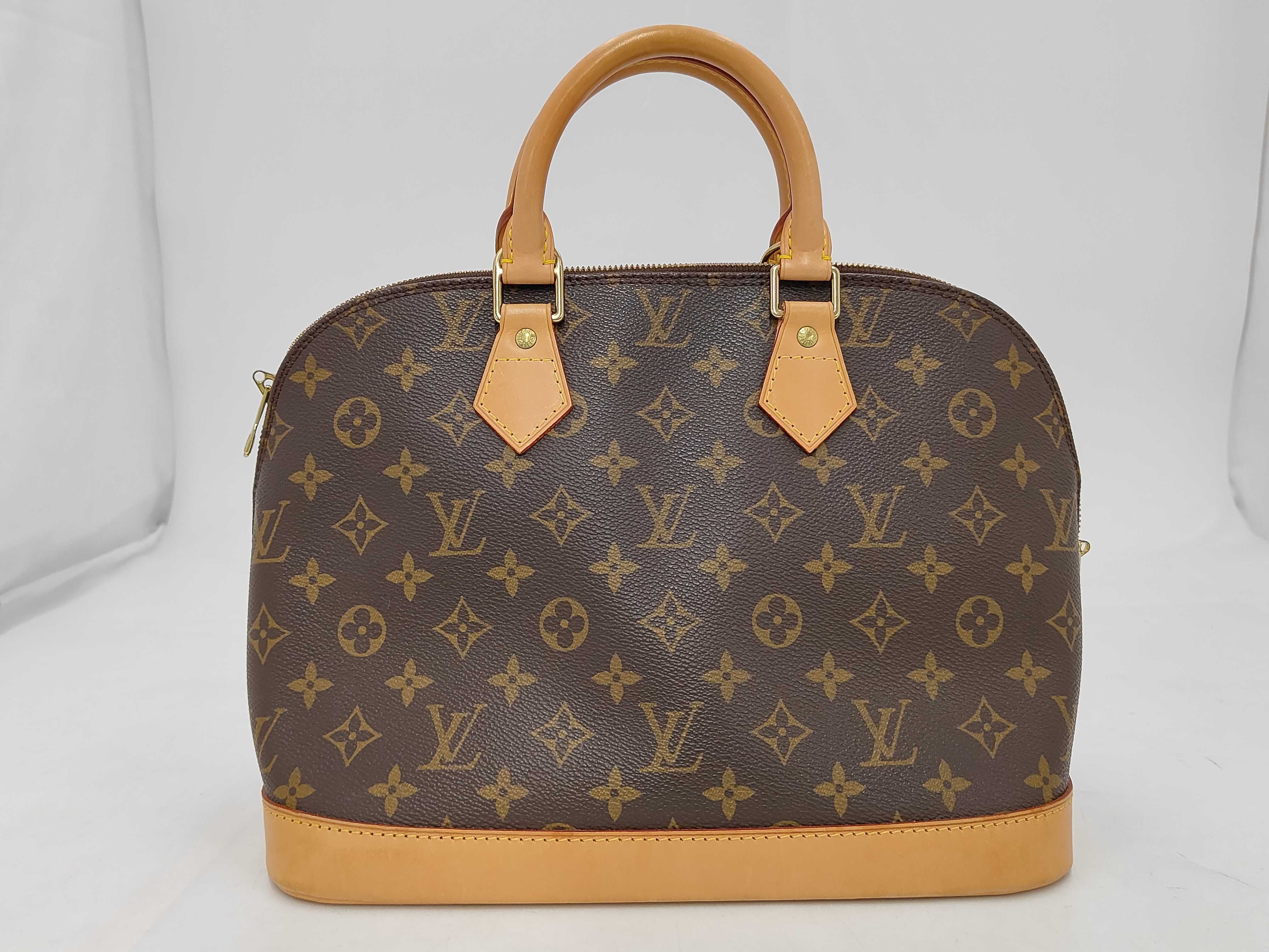 Monogram M40878 Alma MM Alma Handbag