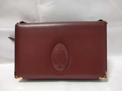 Must line shoulder bag, Bordeaux color.