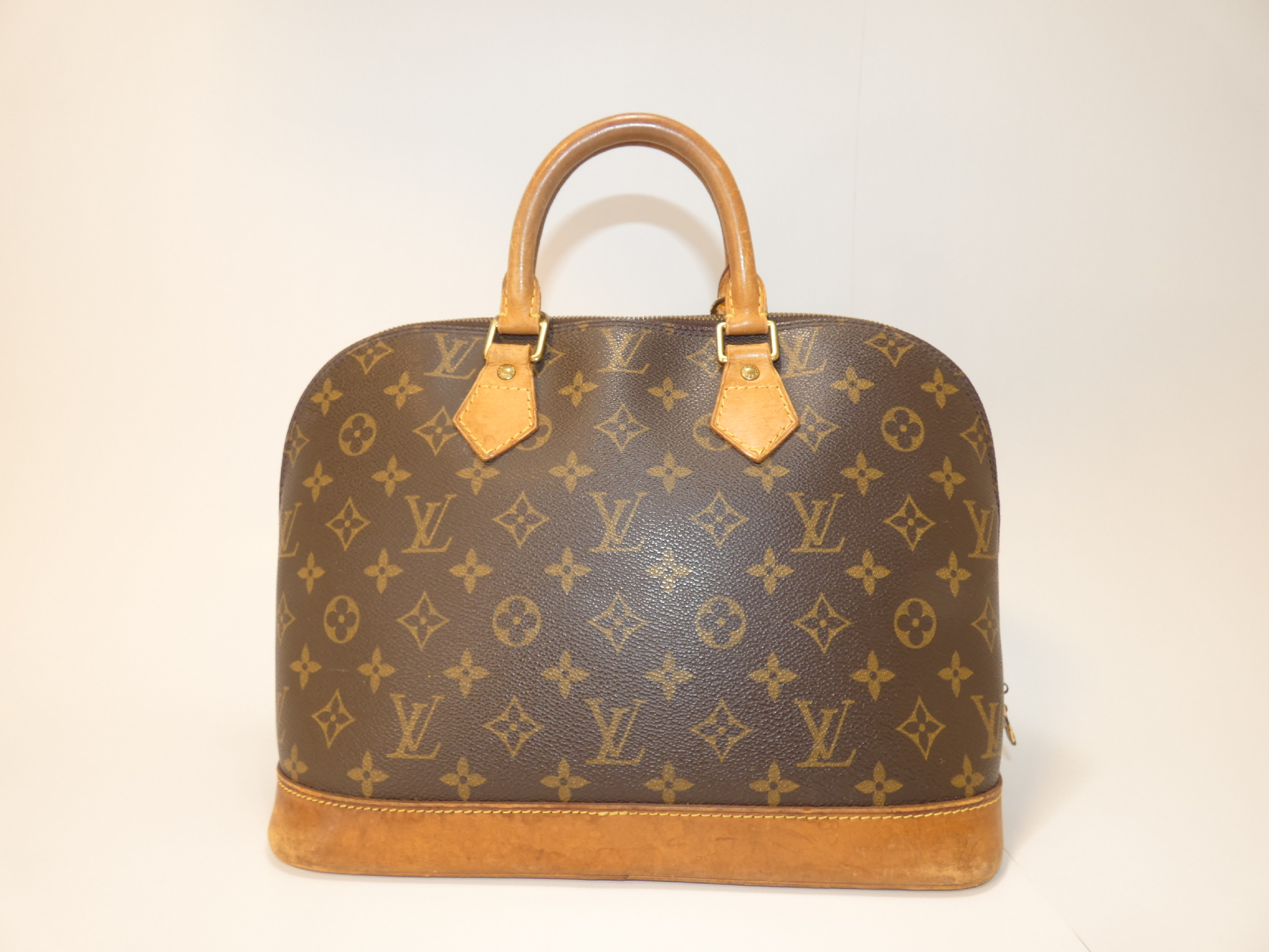 Alma Monogram Handbag