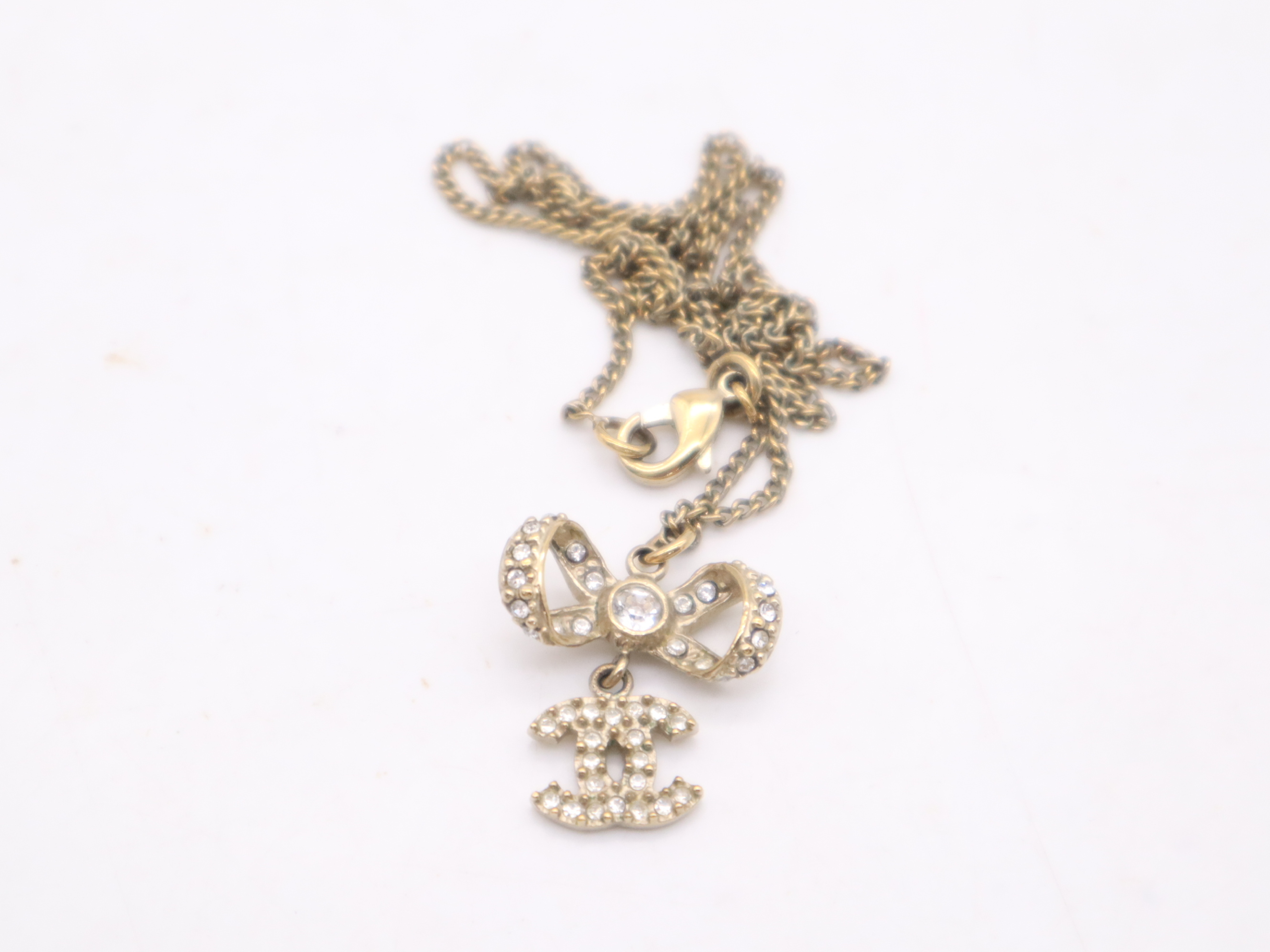 Gold Ribbon Coco Mark Necklace — view 2