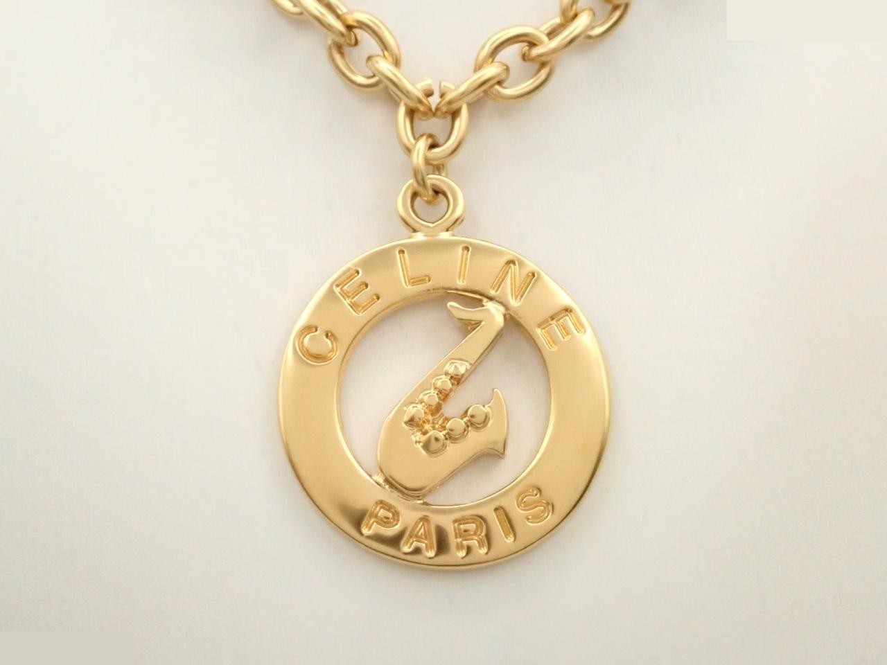Circle logo, gold, chain approximately 84cm