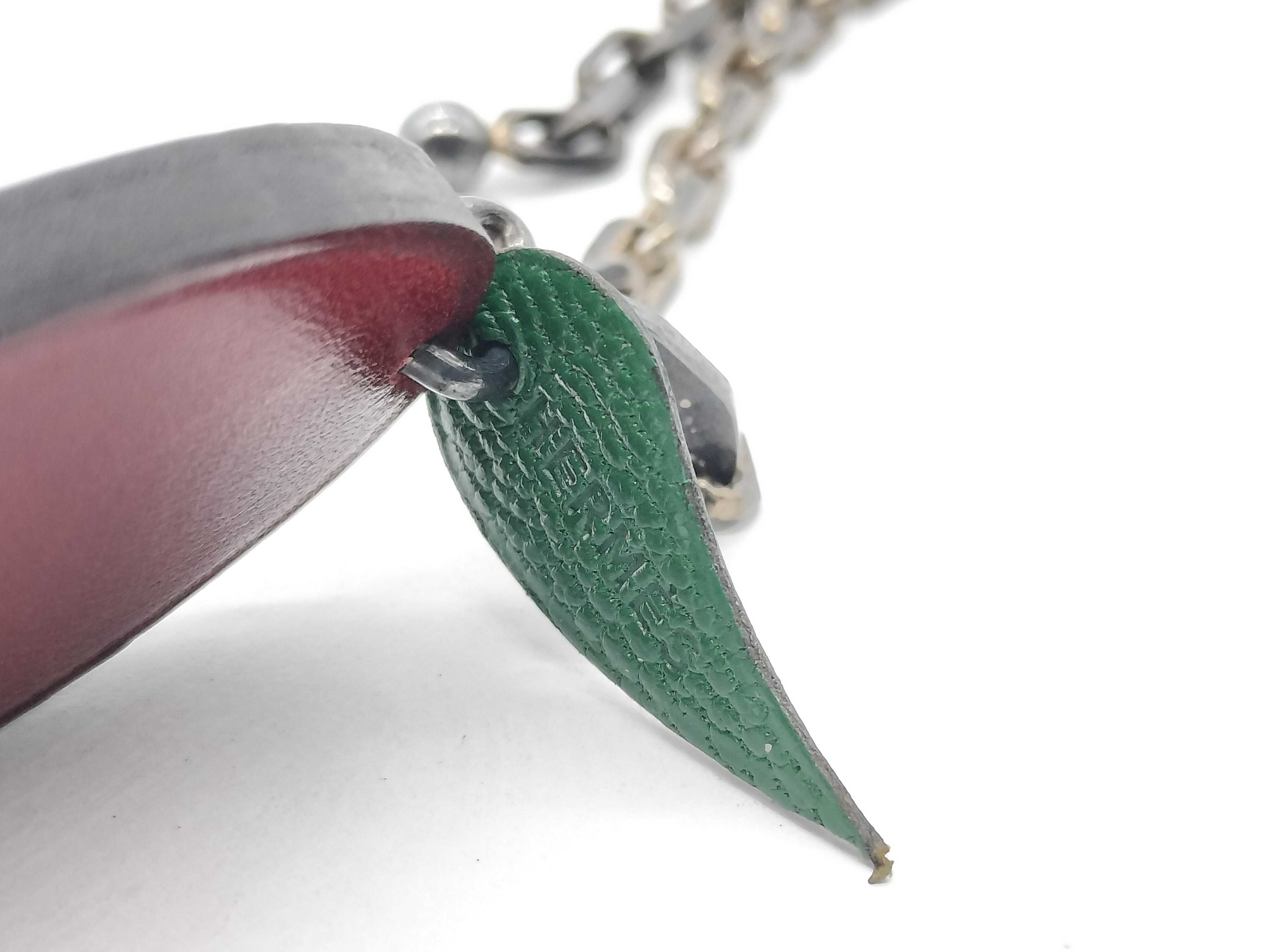 charm, eggplant, and other accessories. — view 5