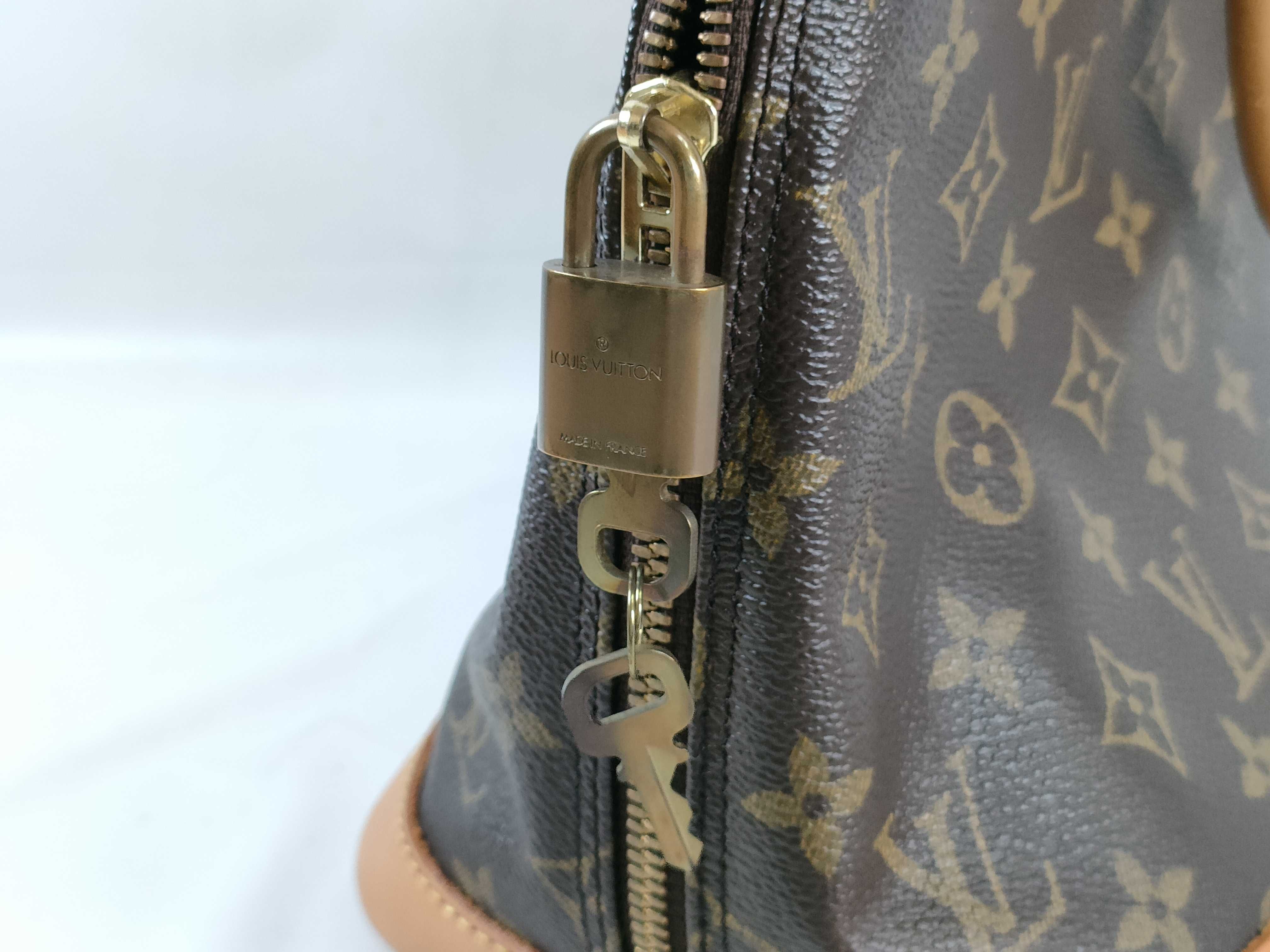 Monogram M51130 Alma Handbag — view 14