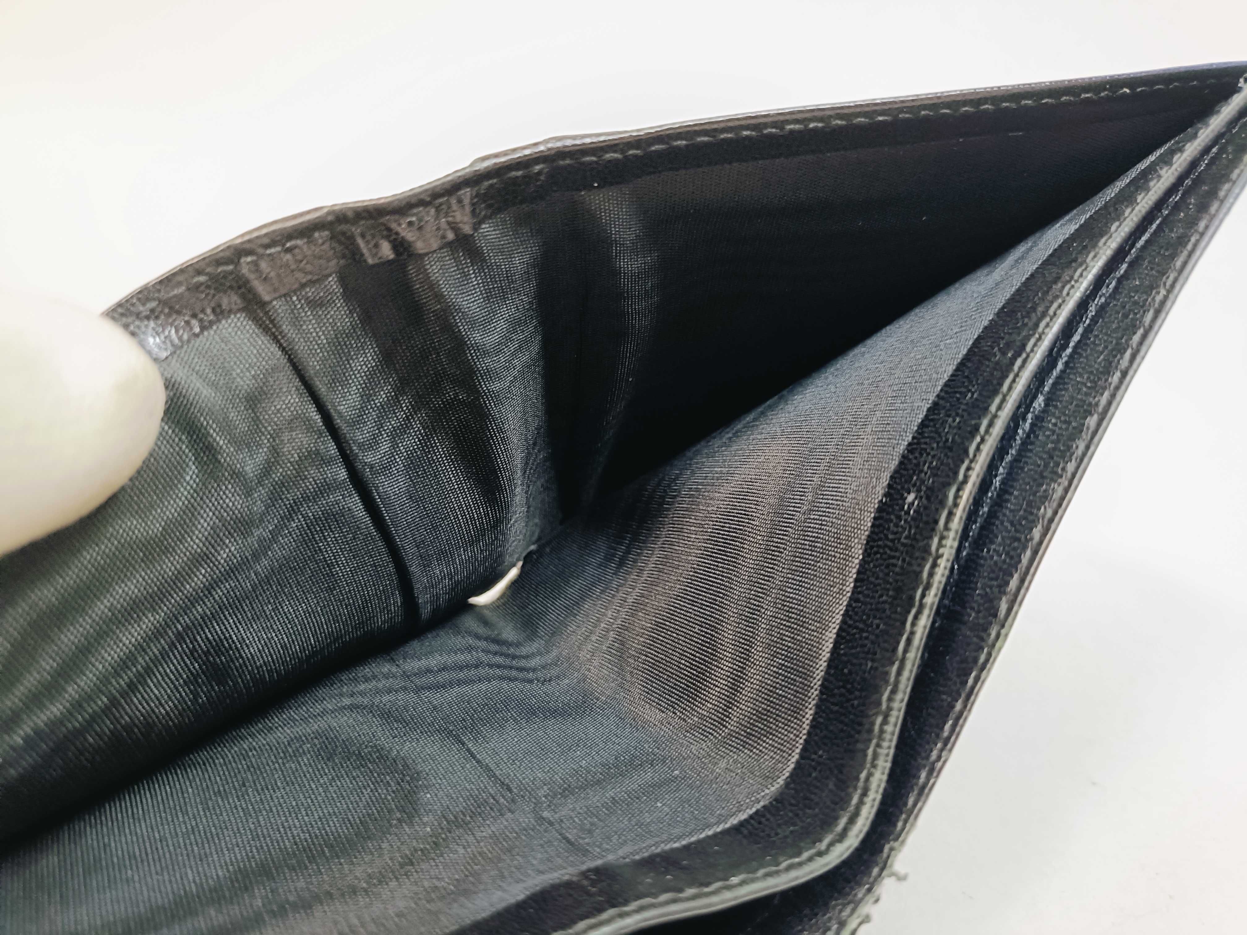 folding wallet, shows signs of wear. — view 12