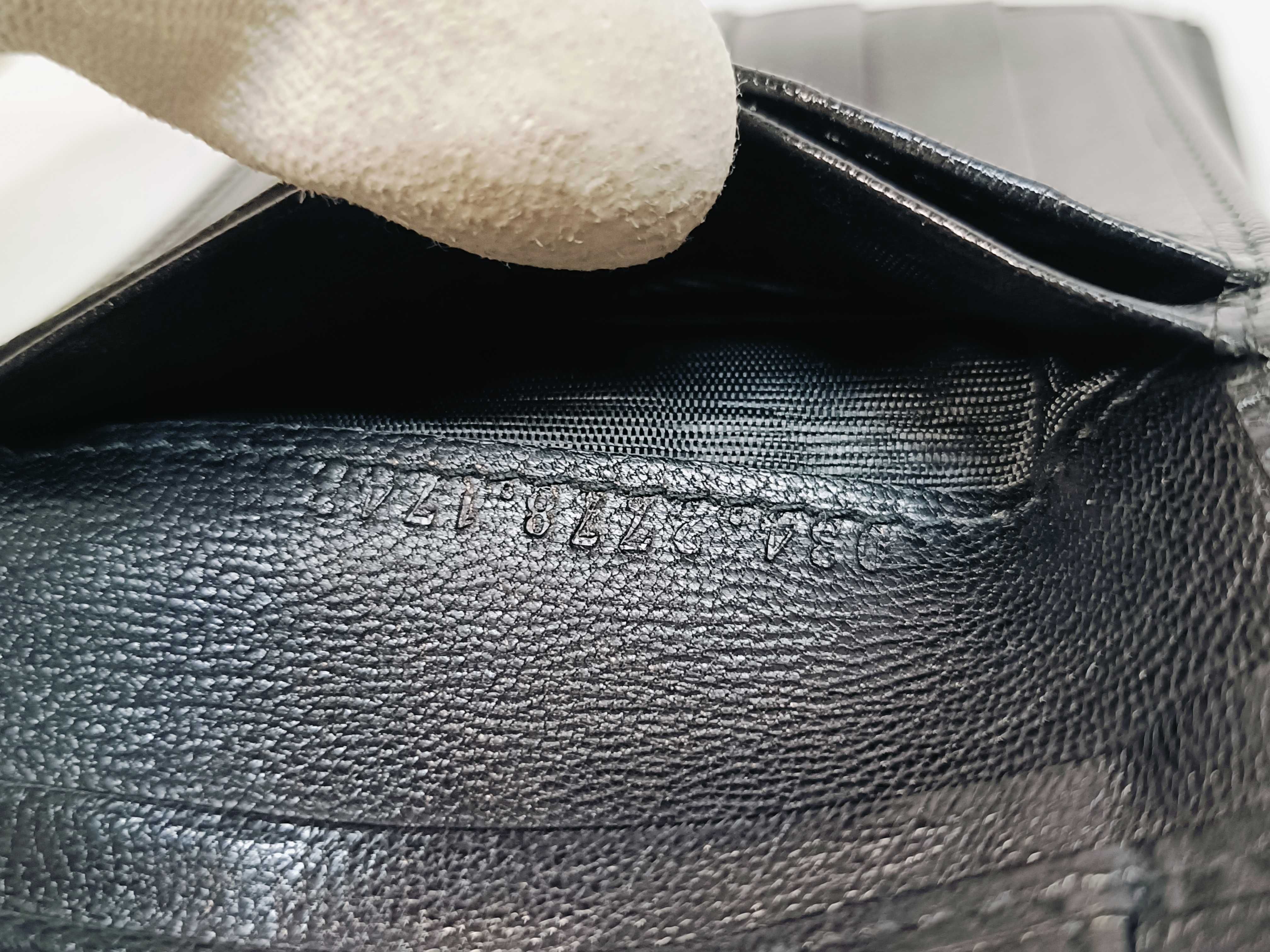 folding wallet, shows signs of wear. — view 15