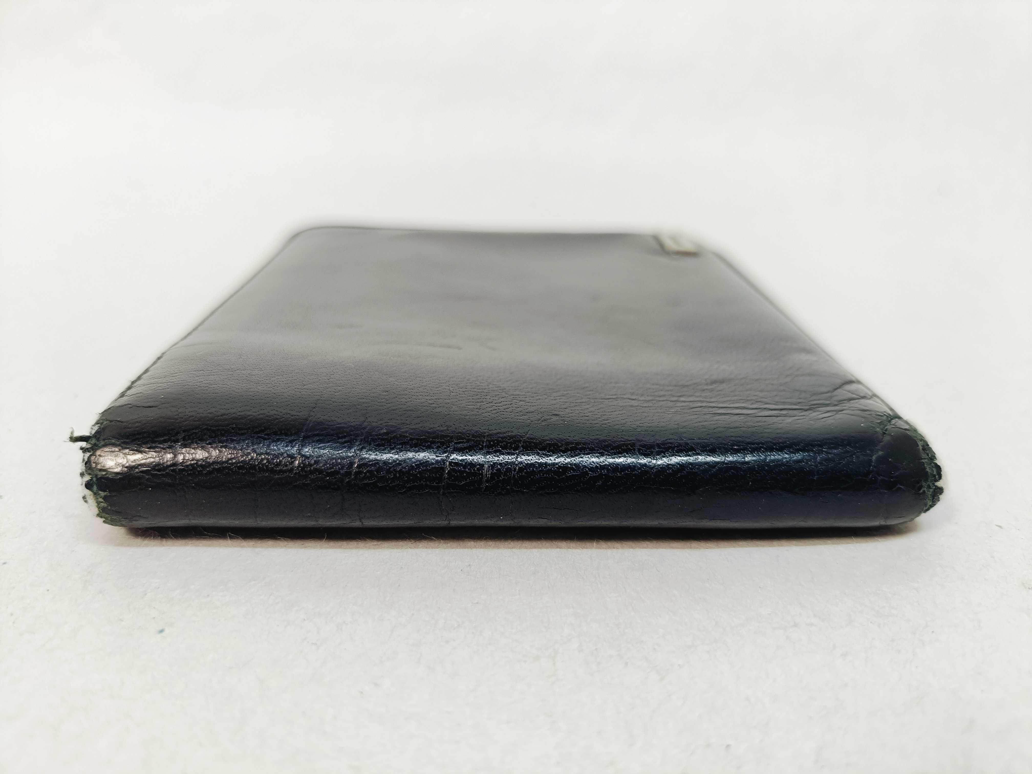 folding wallet, shows signs of wear. — view 3