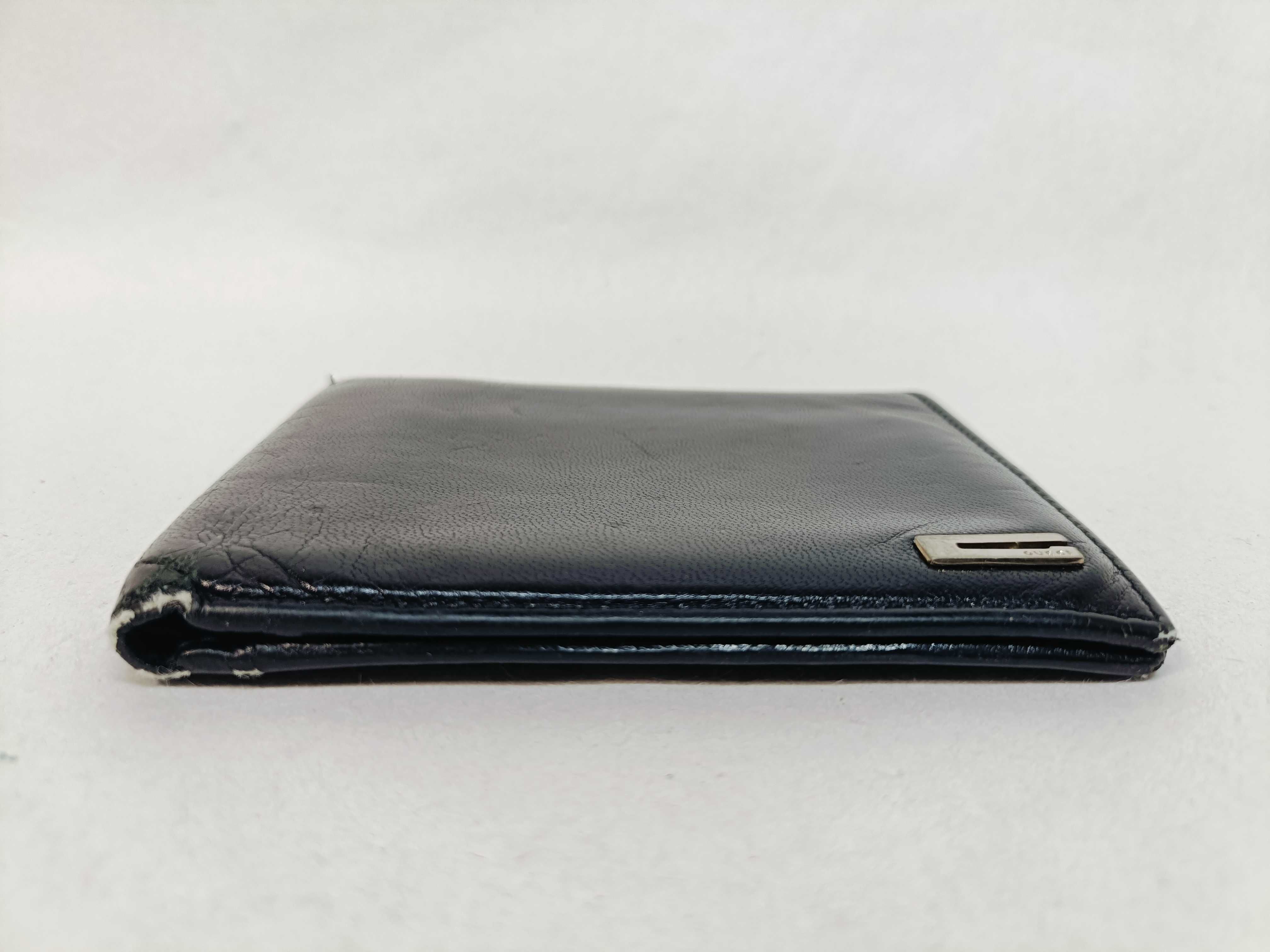 folding wallet, shows signs of wear. — view 5