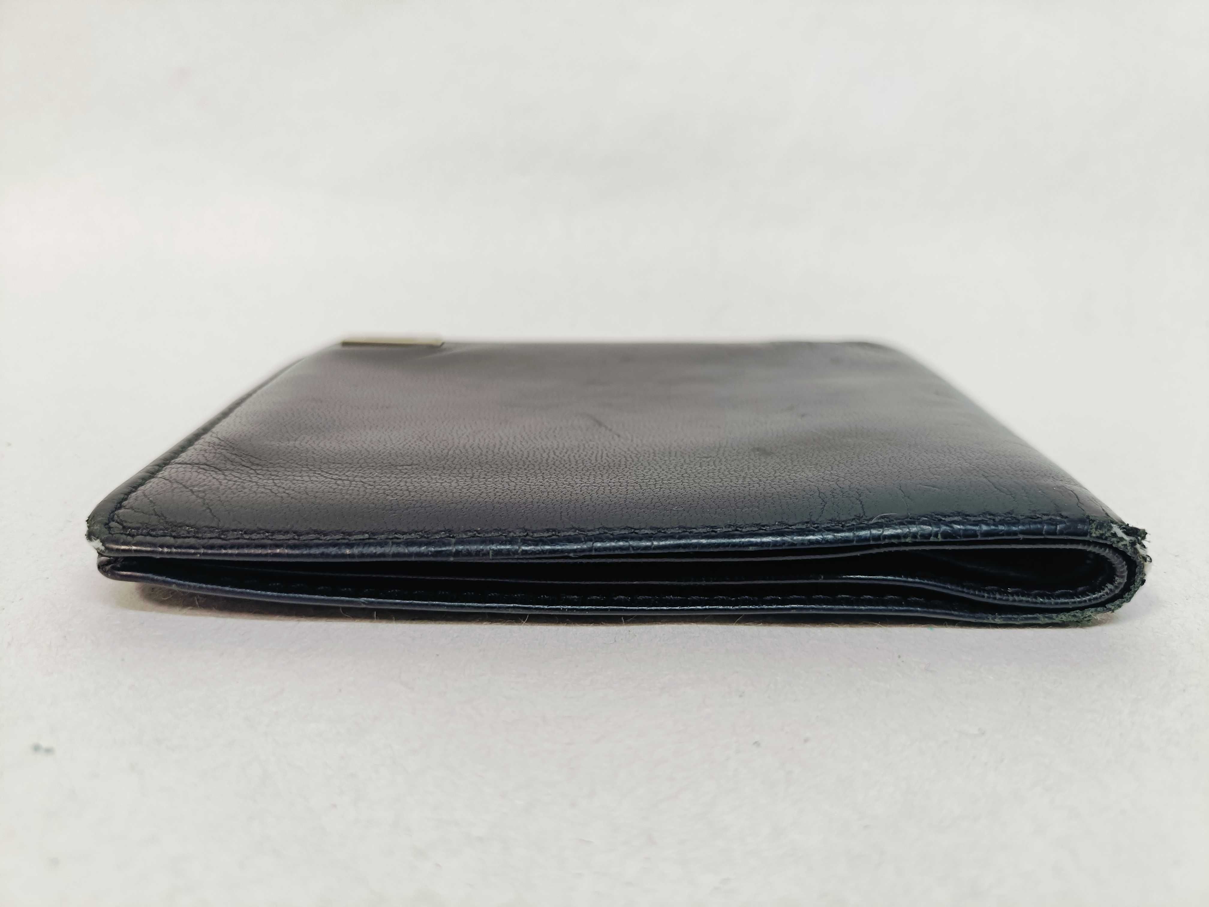 folding wallet, shows signs of wear. — view 6