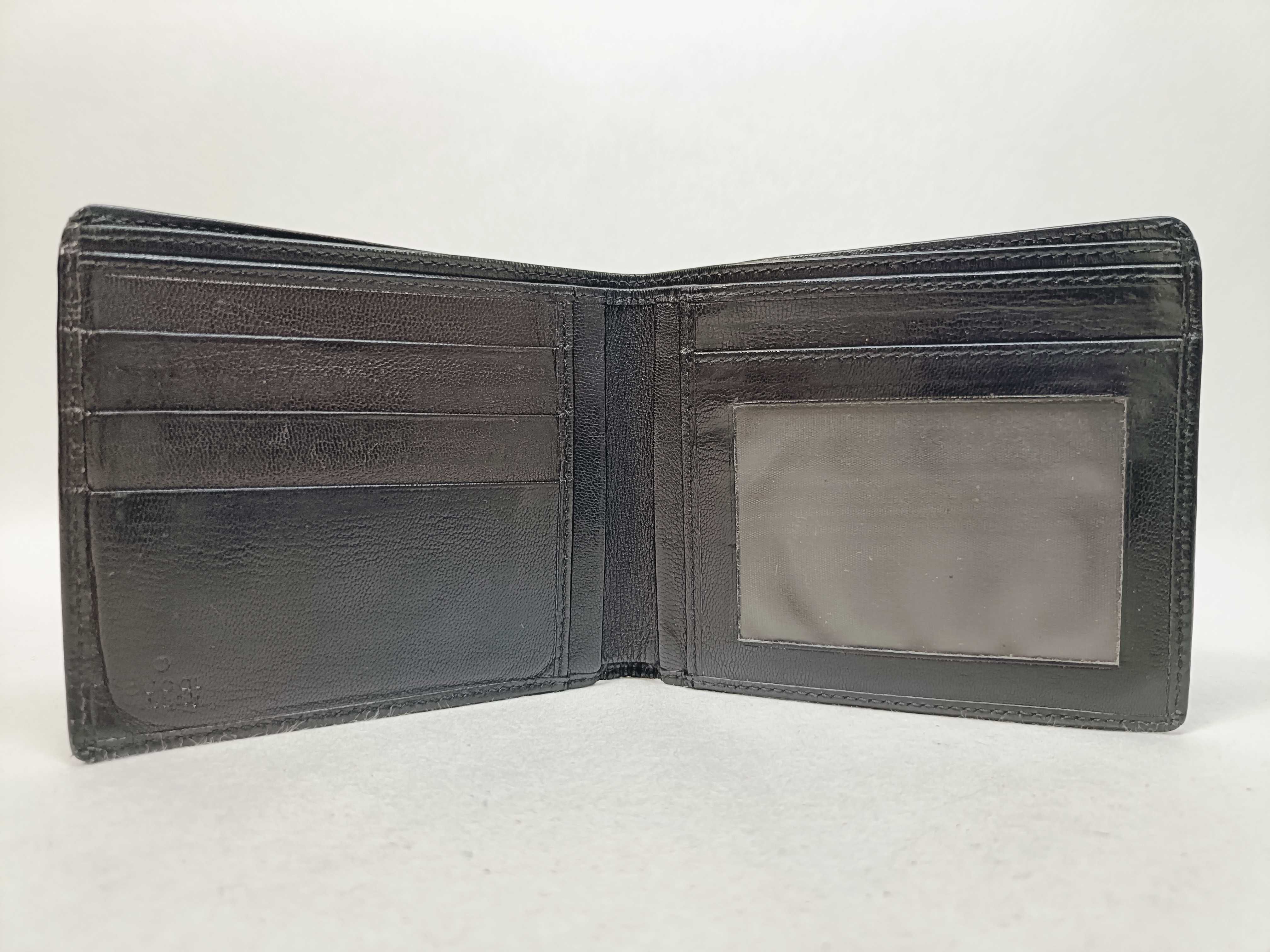 folding wallet, shows signs of wear. — view 8
