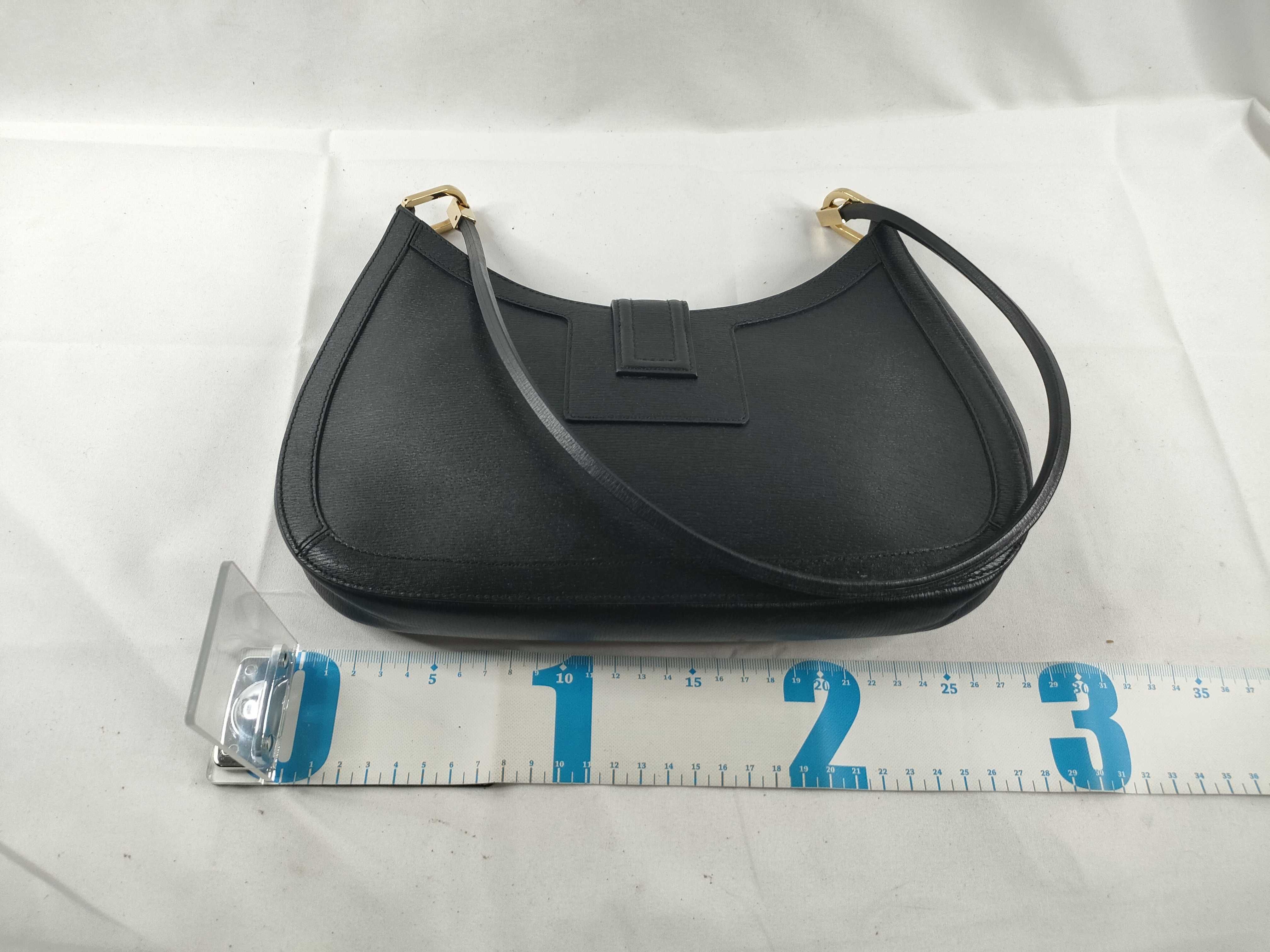 leather shoulder bag with gold hardware. — view 2
