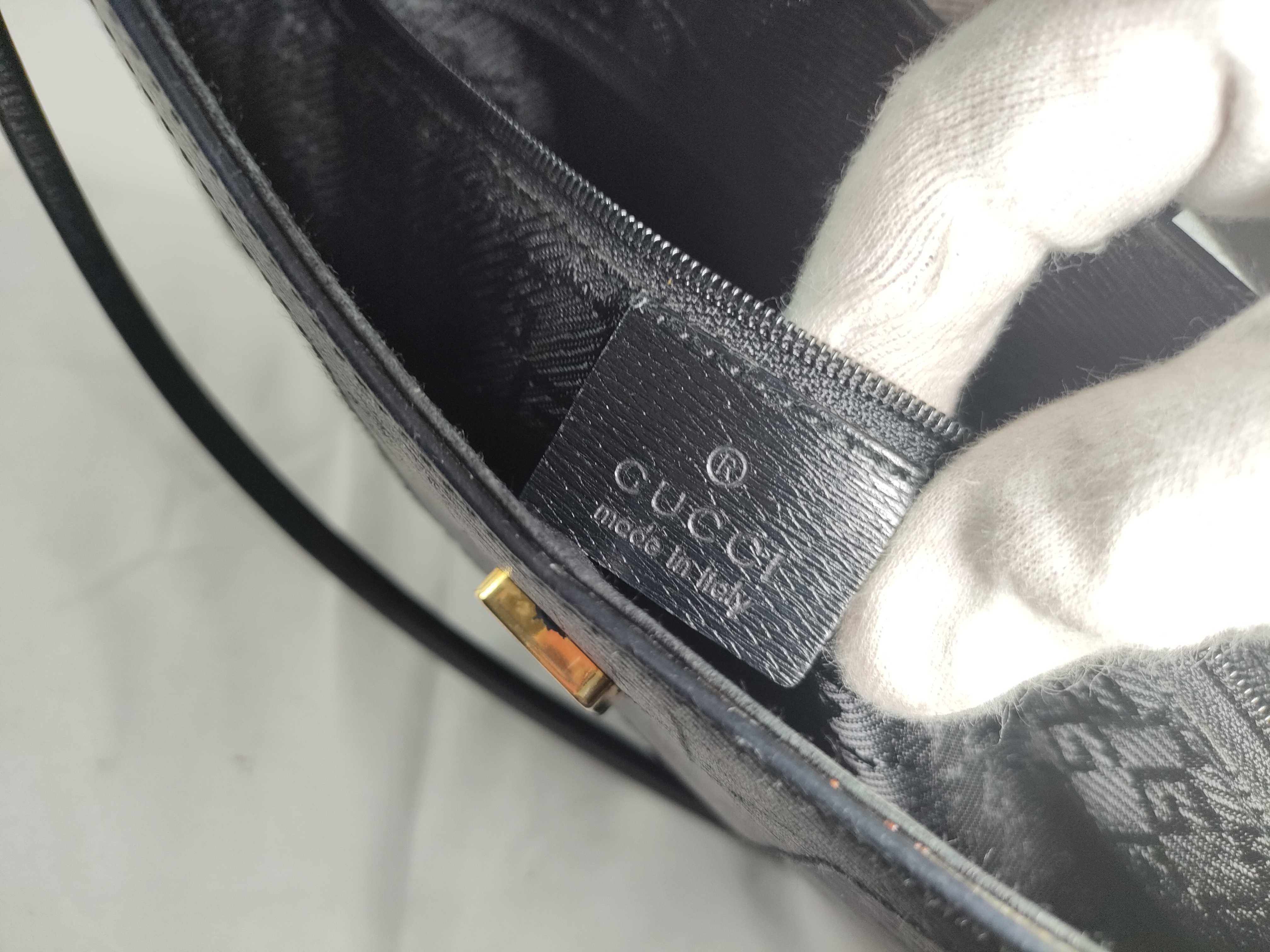 leather shoulder bag with gold hardware. — view 12