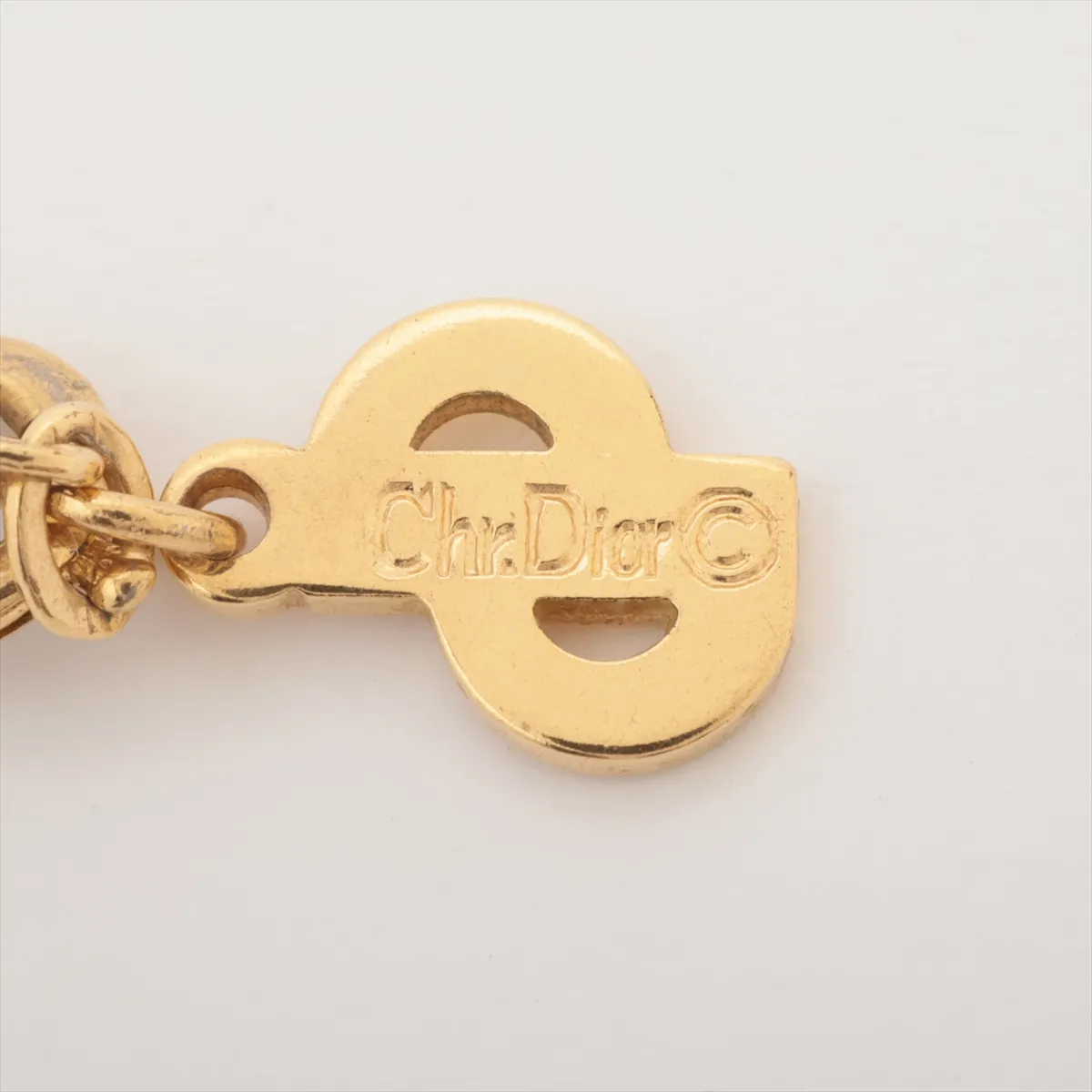 CD logo necklace, gold-plated with rhinestones. Shows signs of wear, — view 4