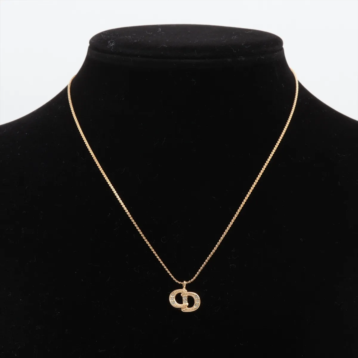 CD logo necklace, gold-plated with rhinestones. Shows signs of wear, — view 5