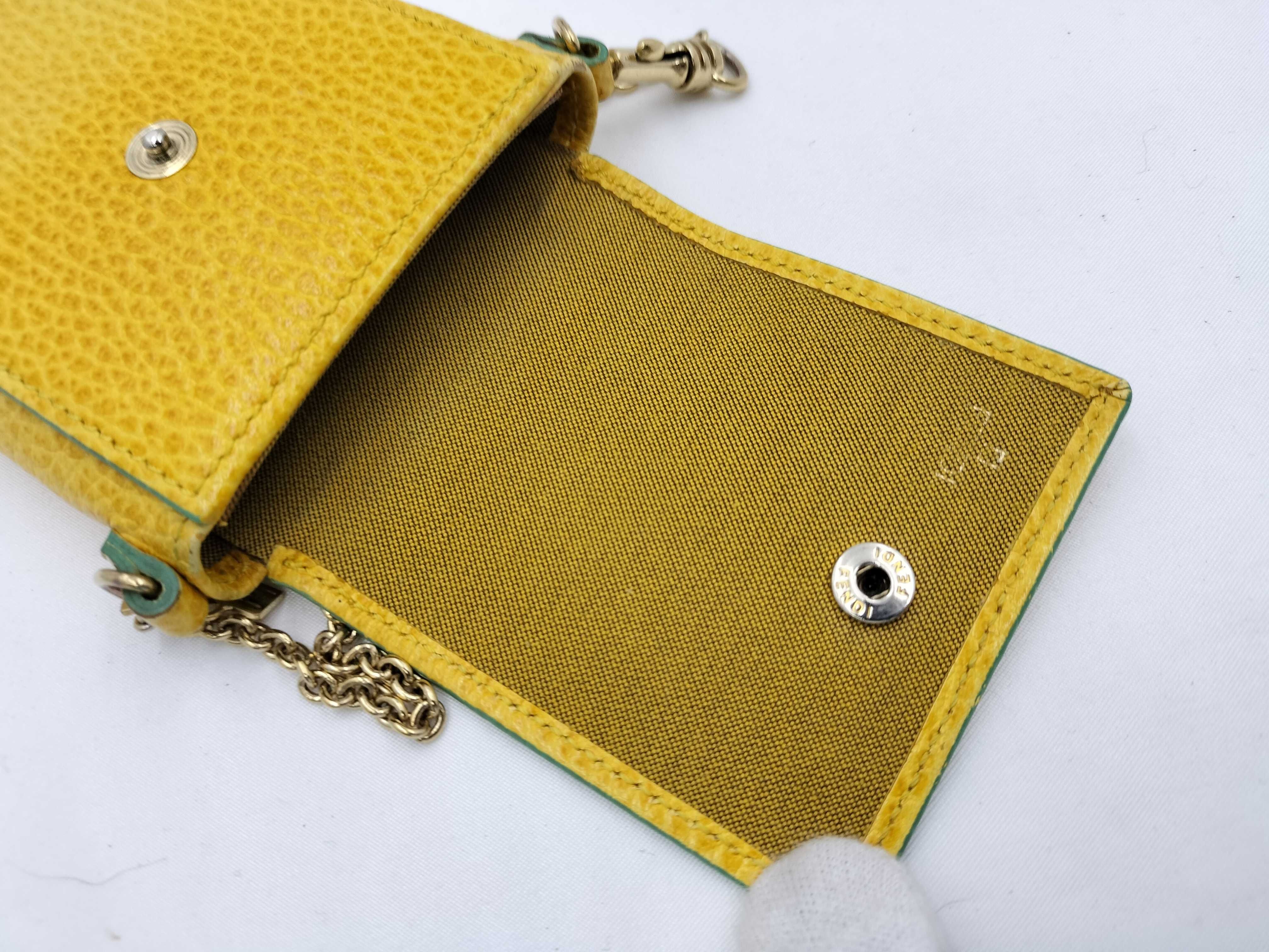 FF logo phone pouch, yellow, significant wear on the logo. — view 12