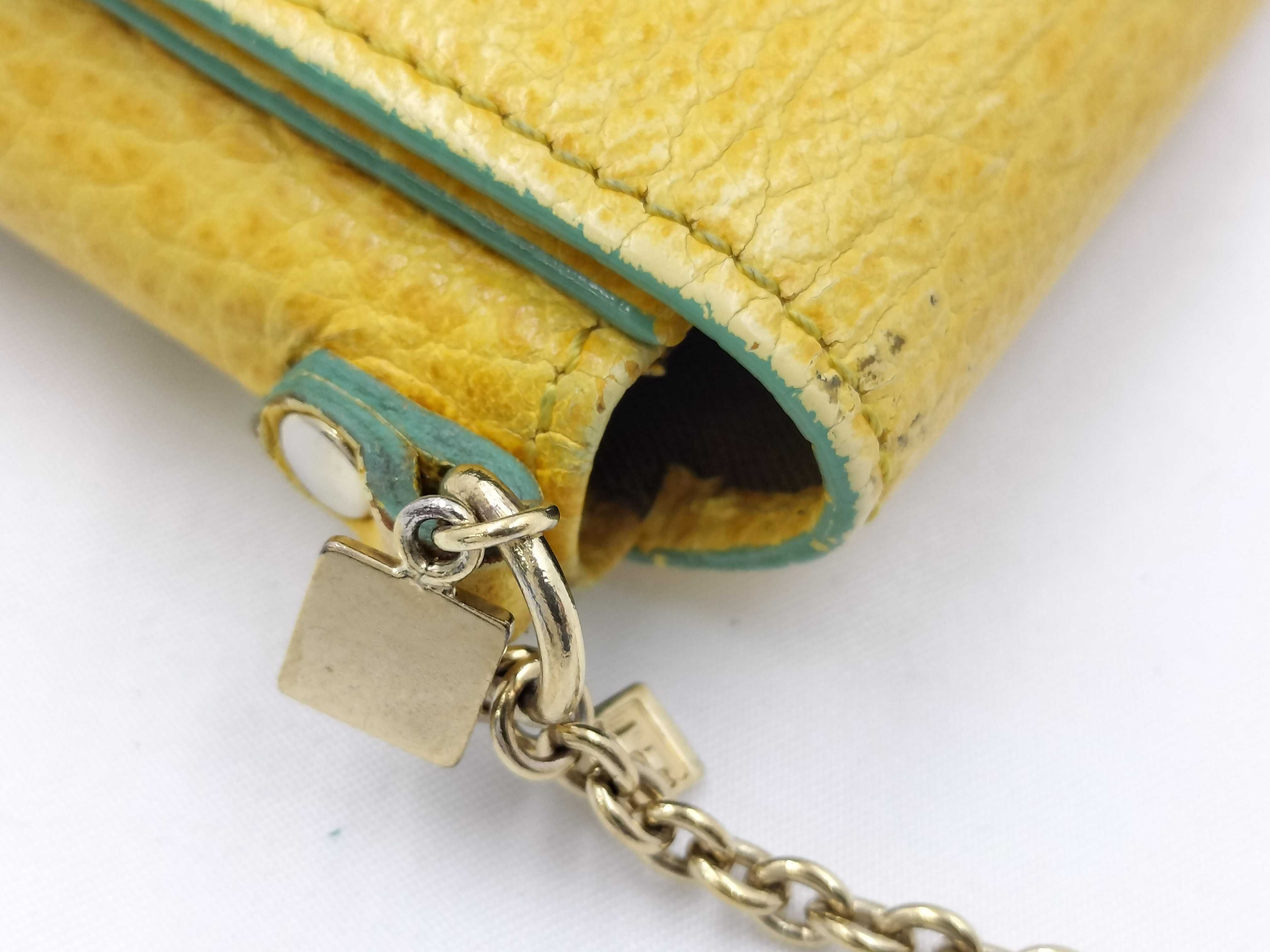 FF logo phone pouch, yellow, significant wear on the logo. — view 6