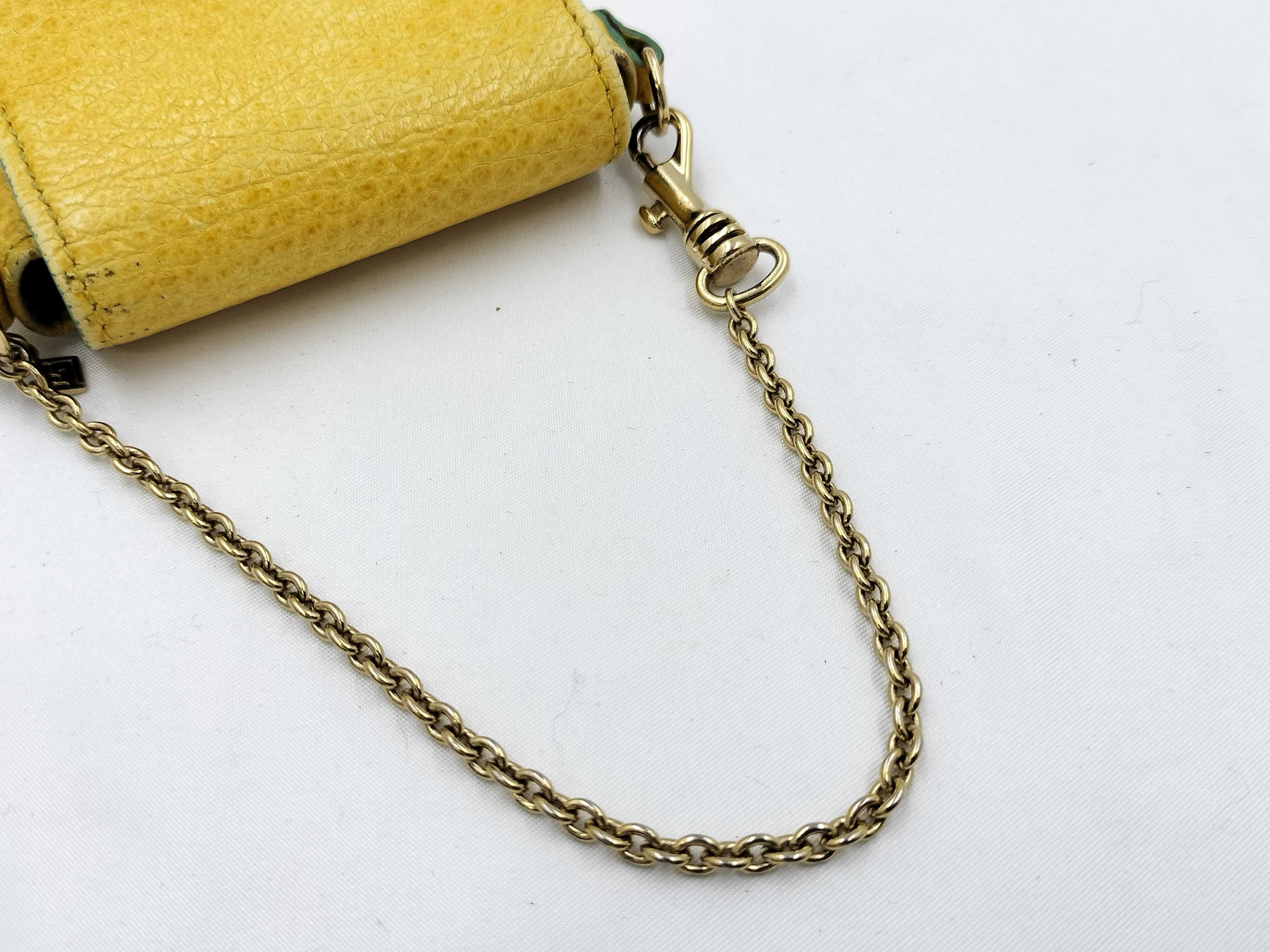 FF logo phone pouch, yellow, significant wear on the logo. — view 7