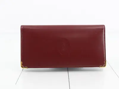 Mustline billfold wallet with box and guarantee card.