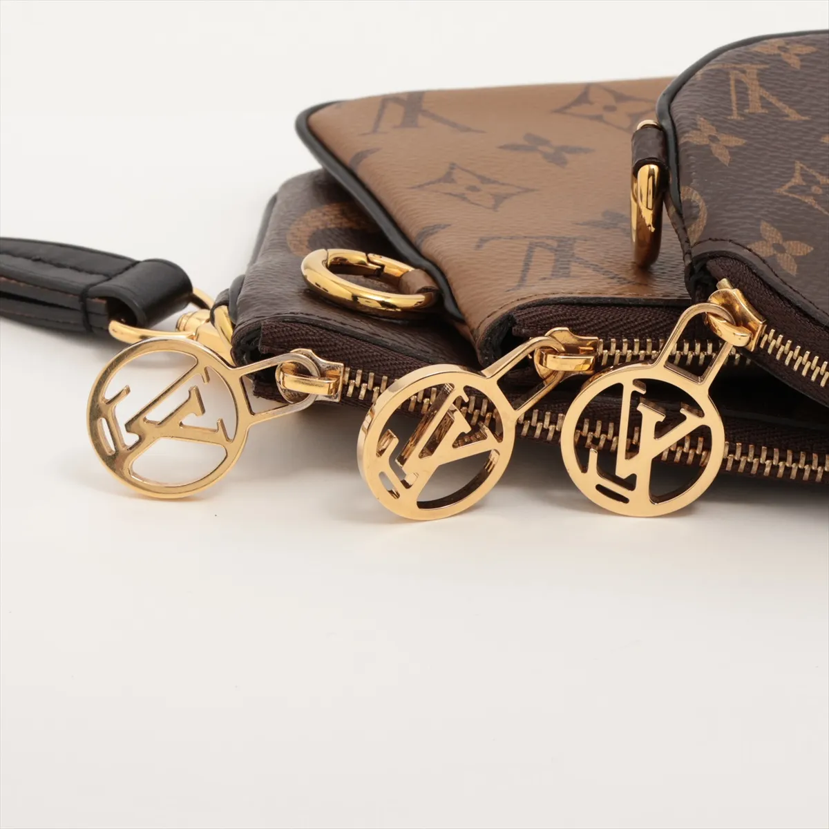 Giant Monogram Reverse Pochette Trio M68756 CN0280 Brown Pouch (RFID detected) — view 8