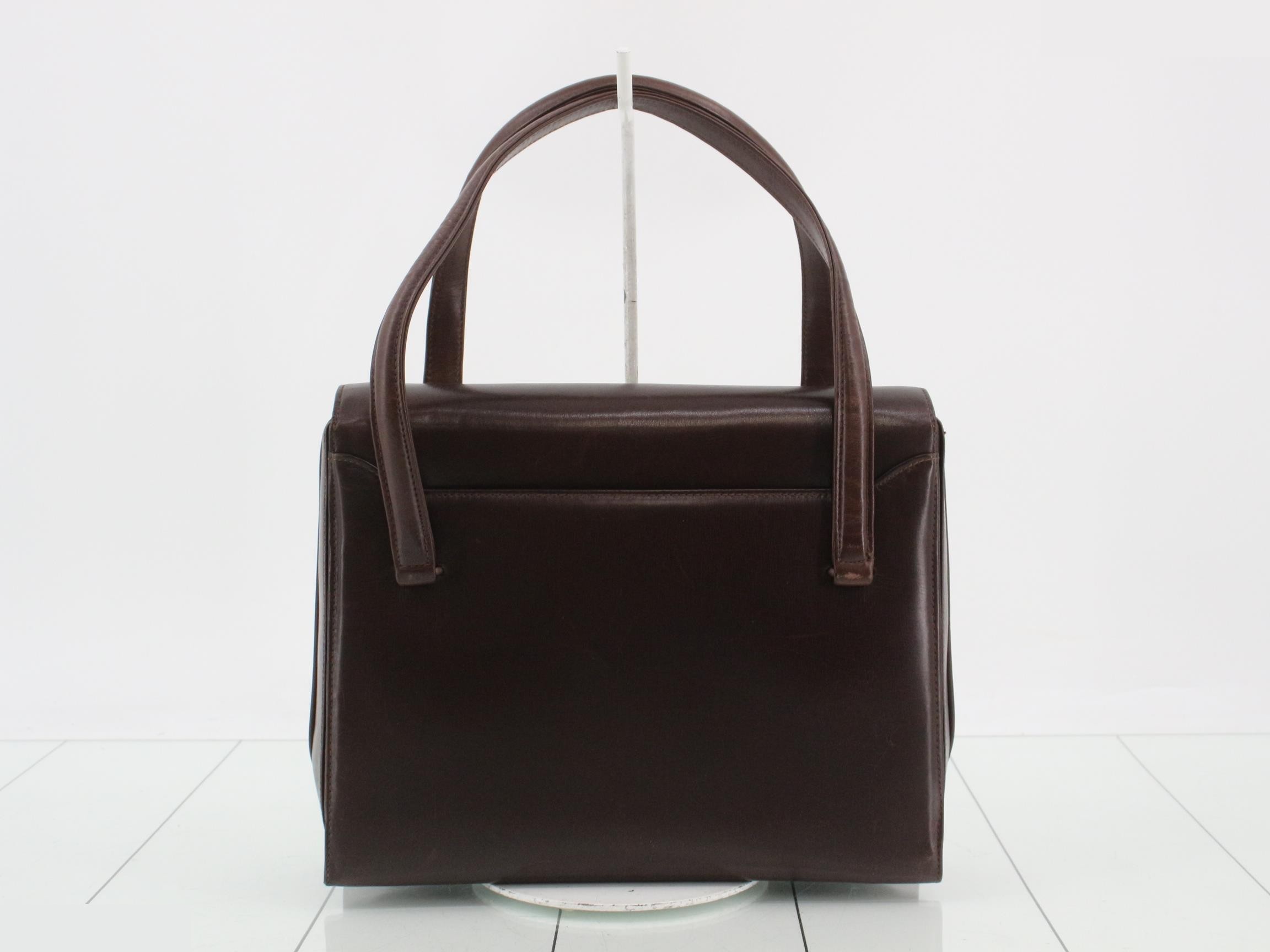 Vintage Gucci leather handbag with gold hardware — view 2