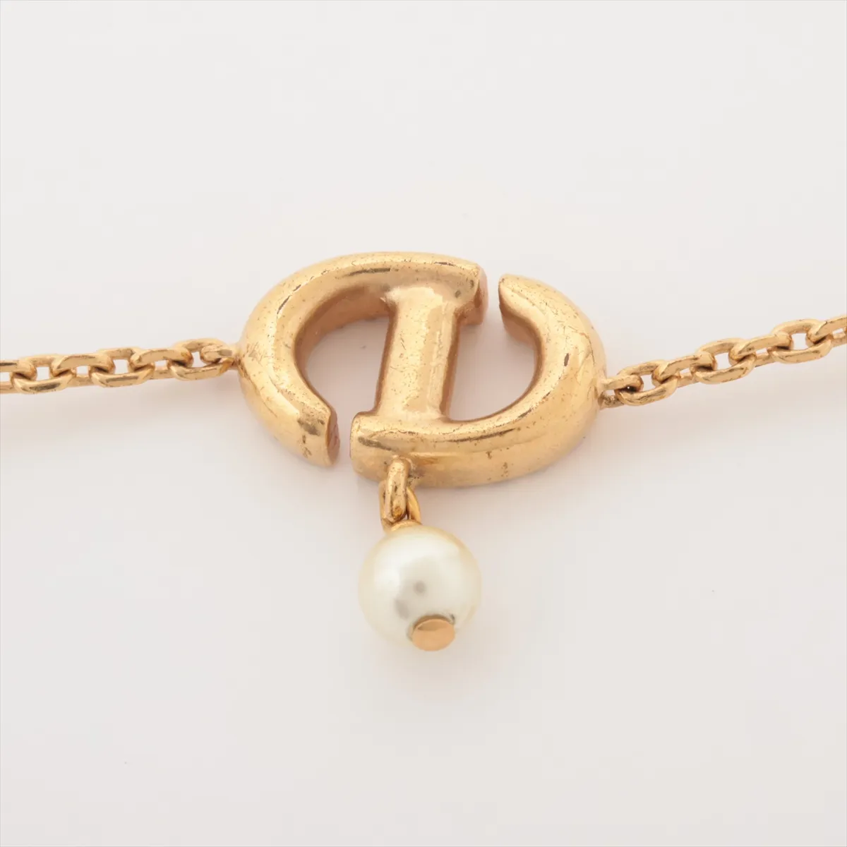 Petit CD bracelet, gold-plated with rhinestones and faux pearls. Shows signs of wear, including — view 3