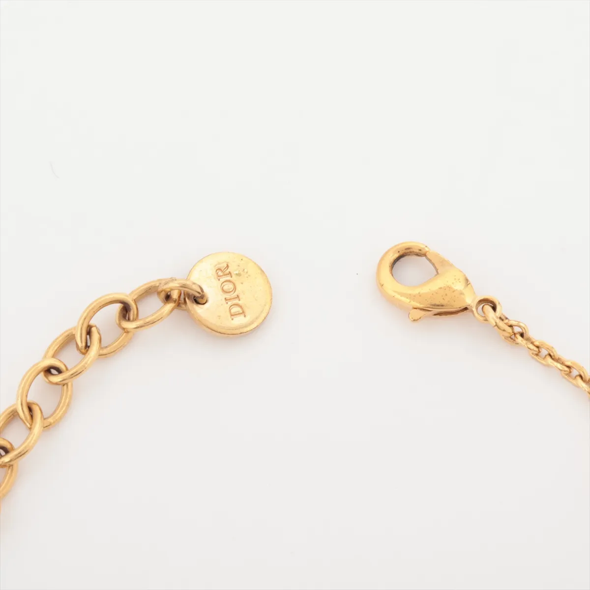Petit CD bracelet, gold-plated with rhinestones and faux pearls. Shows signs of wear, including — view 4