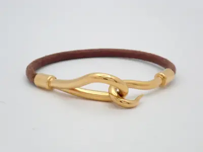 Jumbo bracelet, brown and gold.