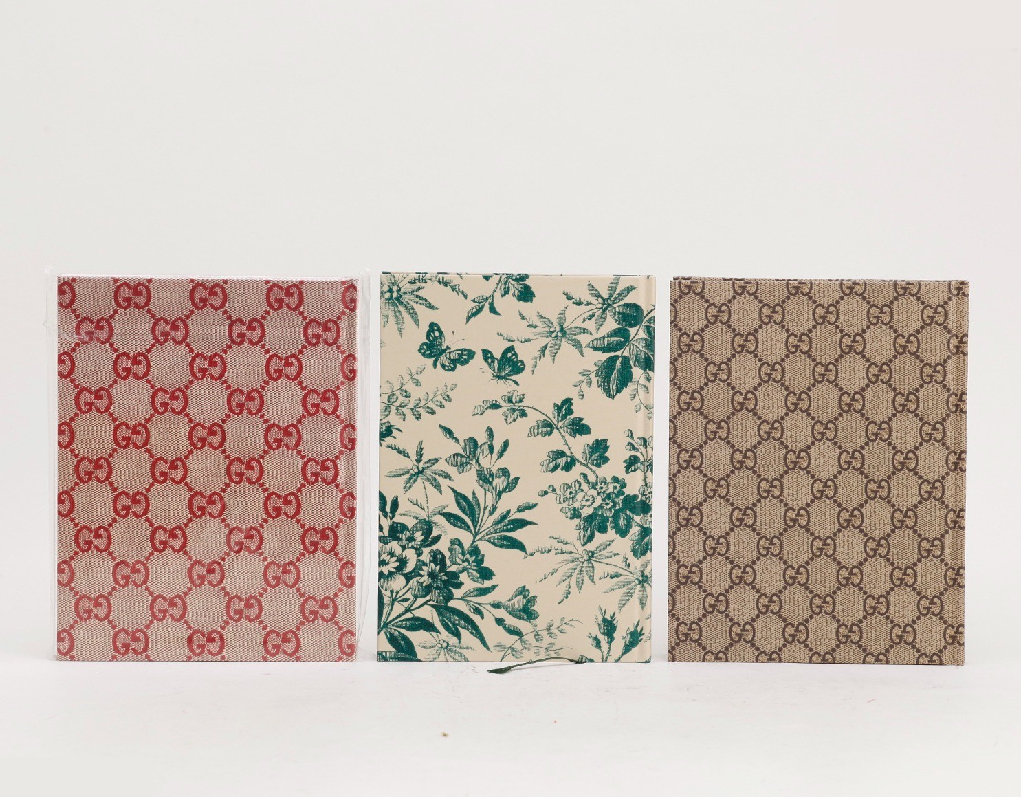 Three notebooks and a novelty item. — view 2
